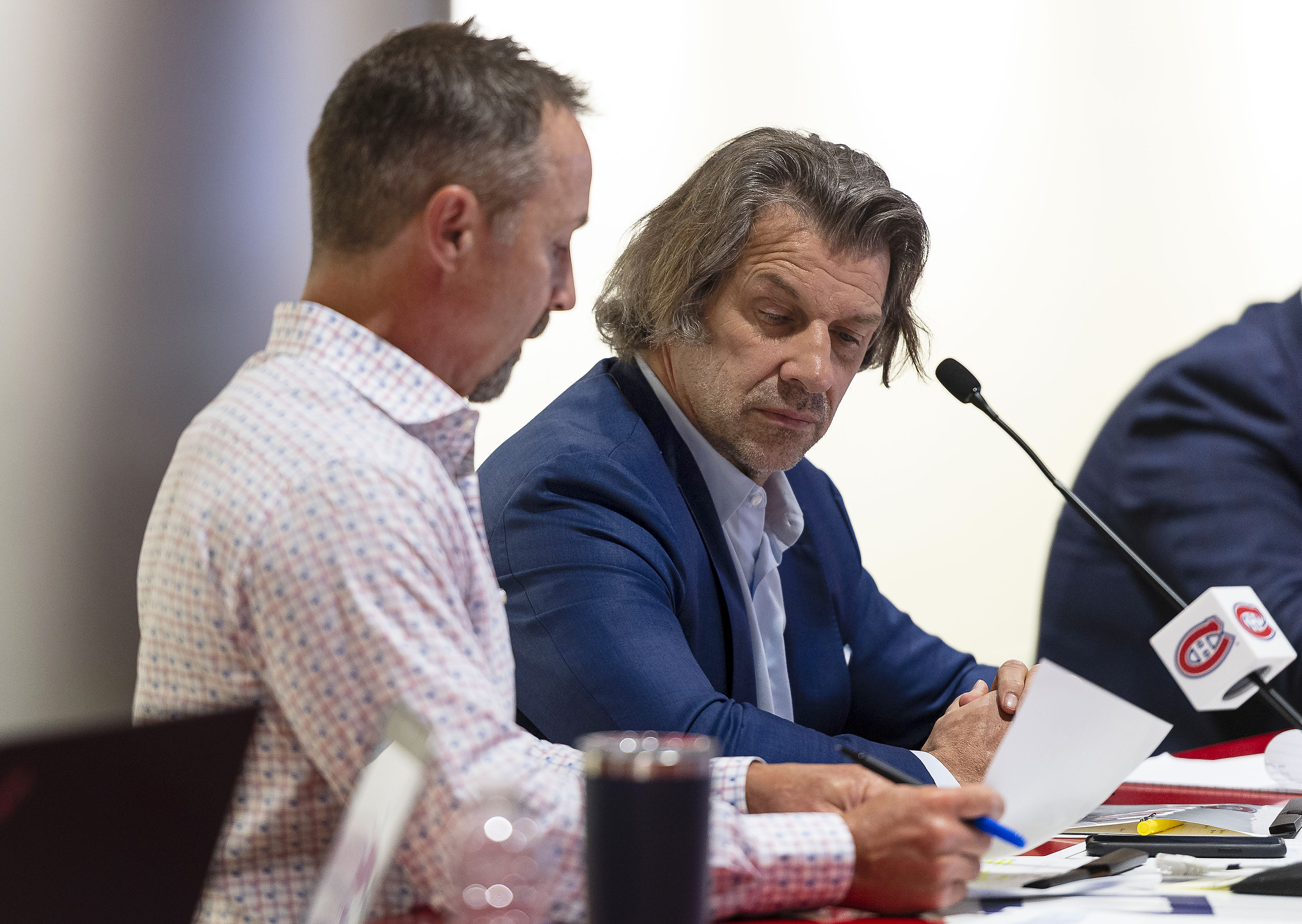 Assistant general manager Trevor Timmins and general manager Marc Bergevin of the Montreal Canadiens attend rounds 2-7 of the 2021 NHL Entry Draft at Bell Center on July 24, 2021 in Montreal, Quebec, Canada.
