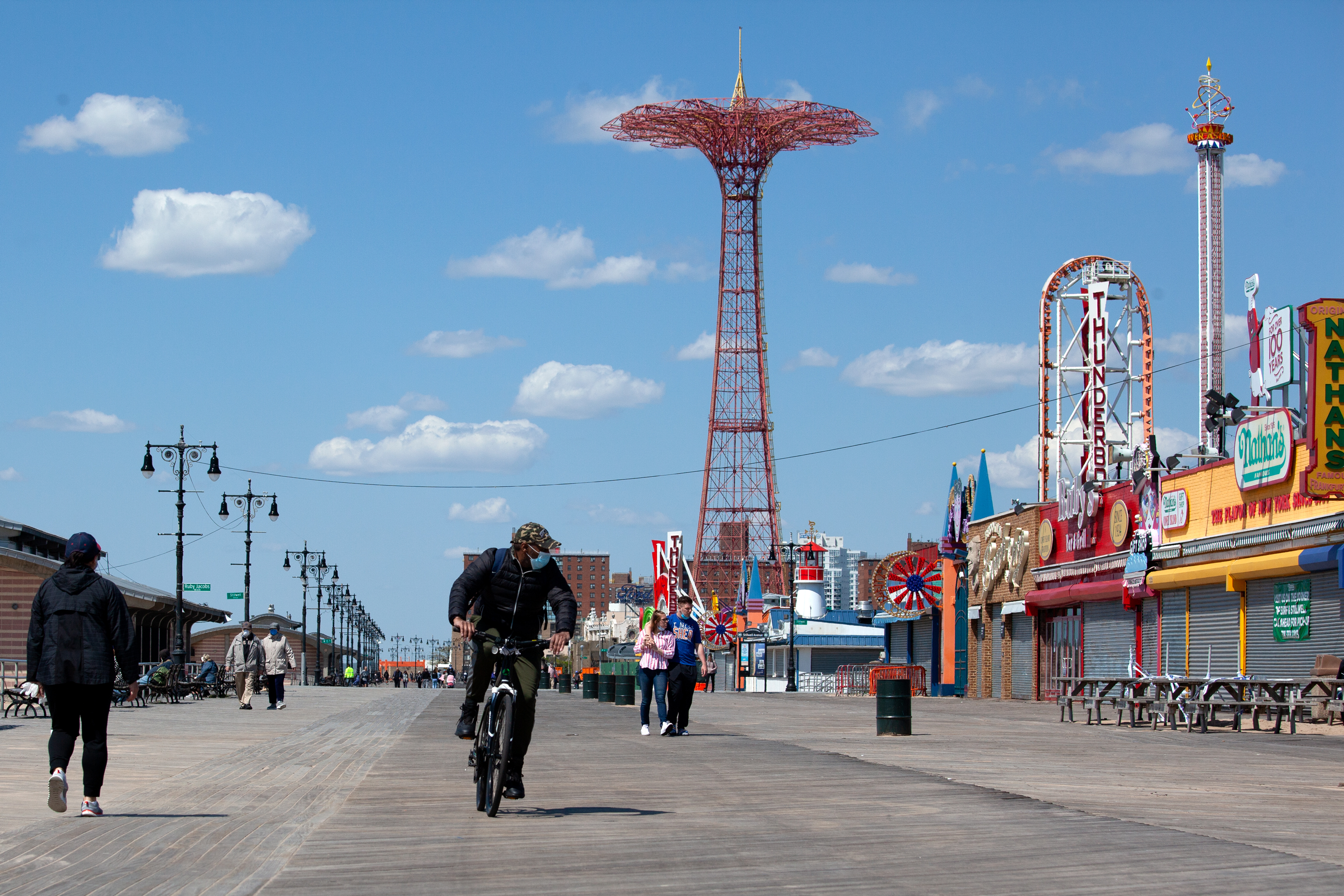 People enjoy the Coney Island boardwalk during the COVID pandemic, May 7, 2020.