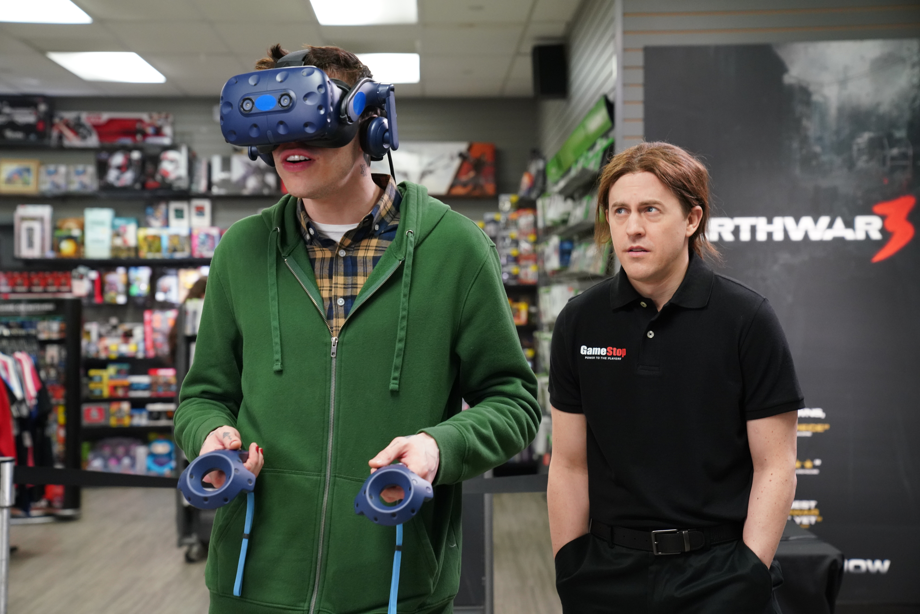 Pete Davidson wears a VR headset inside a GameStop in a Saturday Night Live skit.