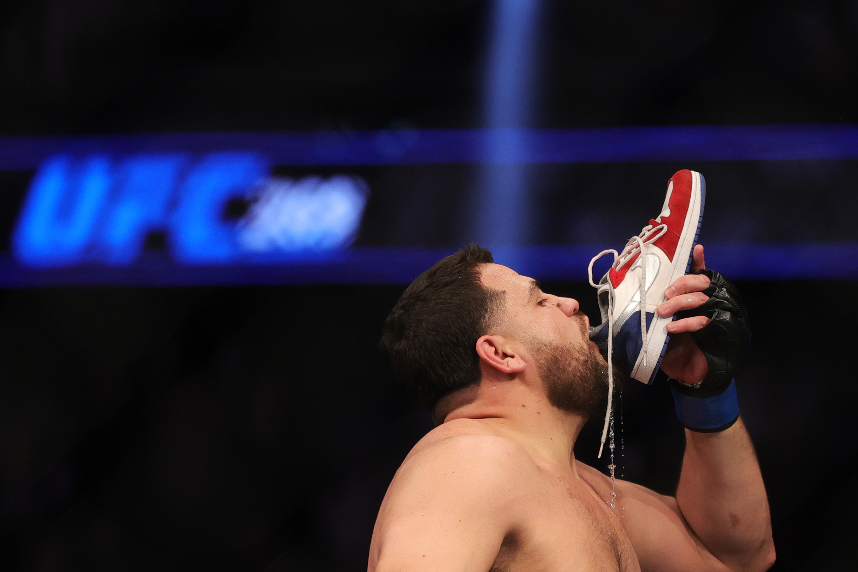 Tai Tuivasa celebrates his UFC 269 win with the traditional shoey.