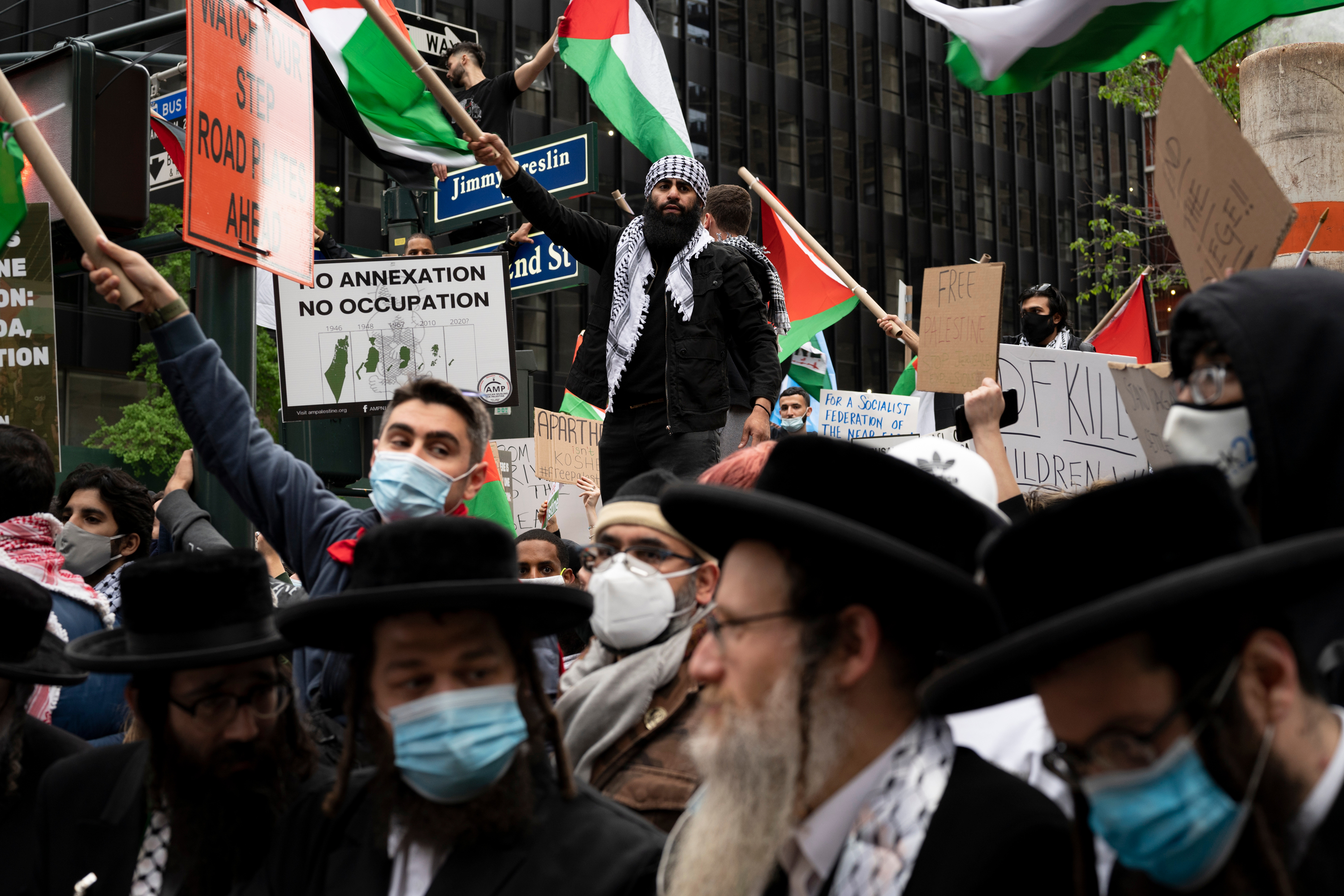 Pro-Palestinian-rights advocates rally in front of the Israeli consulate in New York City, May 11, 2021.