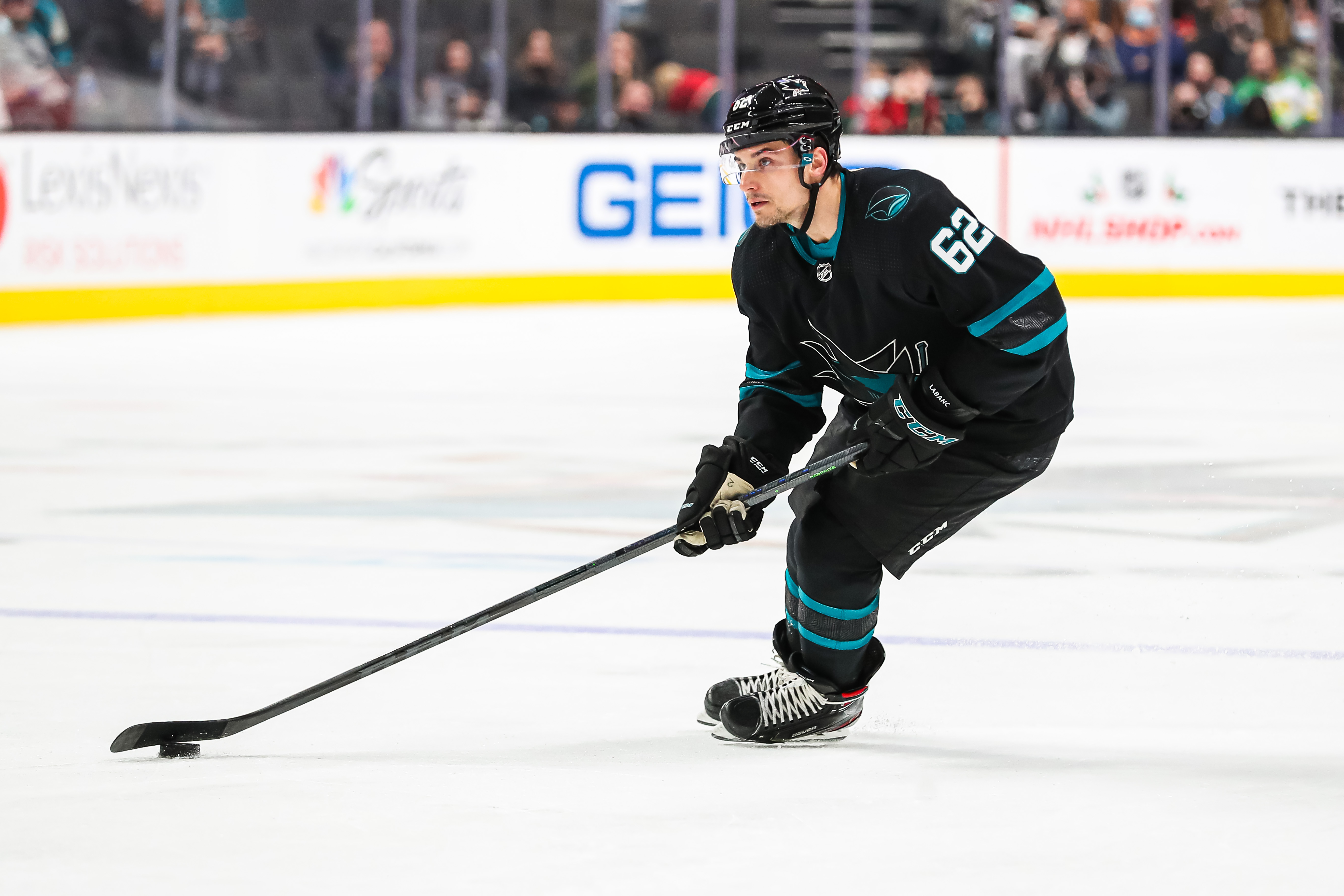 Kevin Labanc #62 of the San Jose Sharks skates with the puck, during the third period of a regular season game against the Minnesota Wild at SAP Center on December 9, 2021 in San Jose, California.