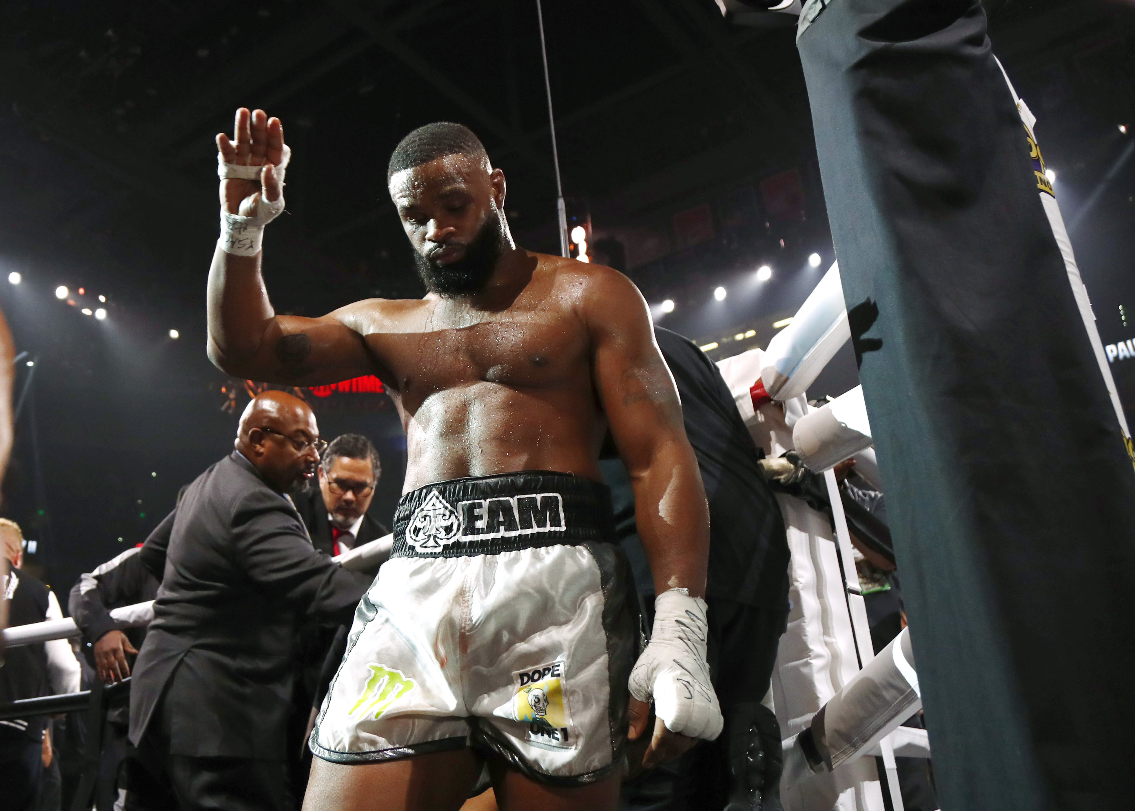 Tyron Woodley leaving the ring after being knocked out by Jake Paul in December. 