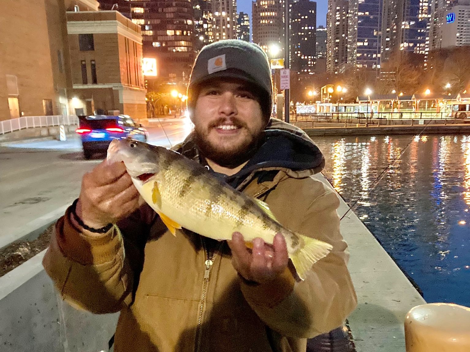 Quinn Wunar with his really big perch, caught on the Chicago lakefront. Provided photo