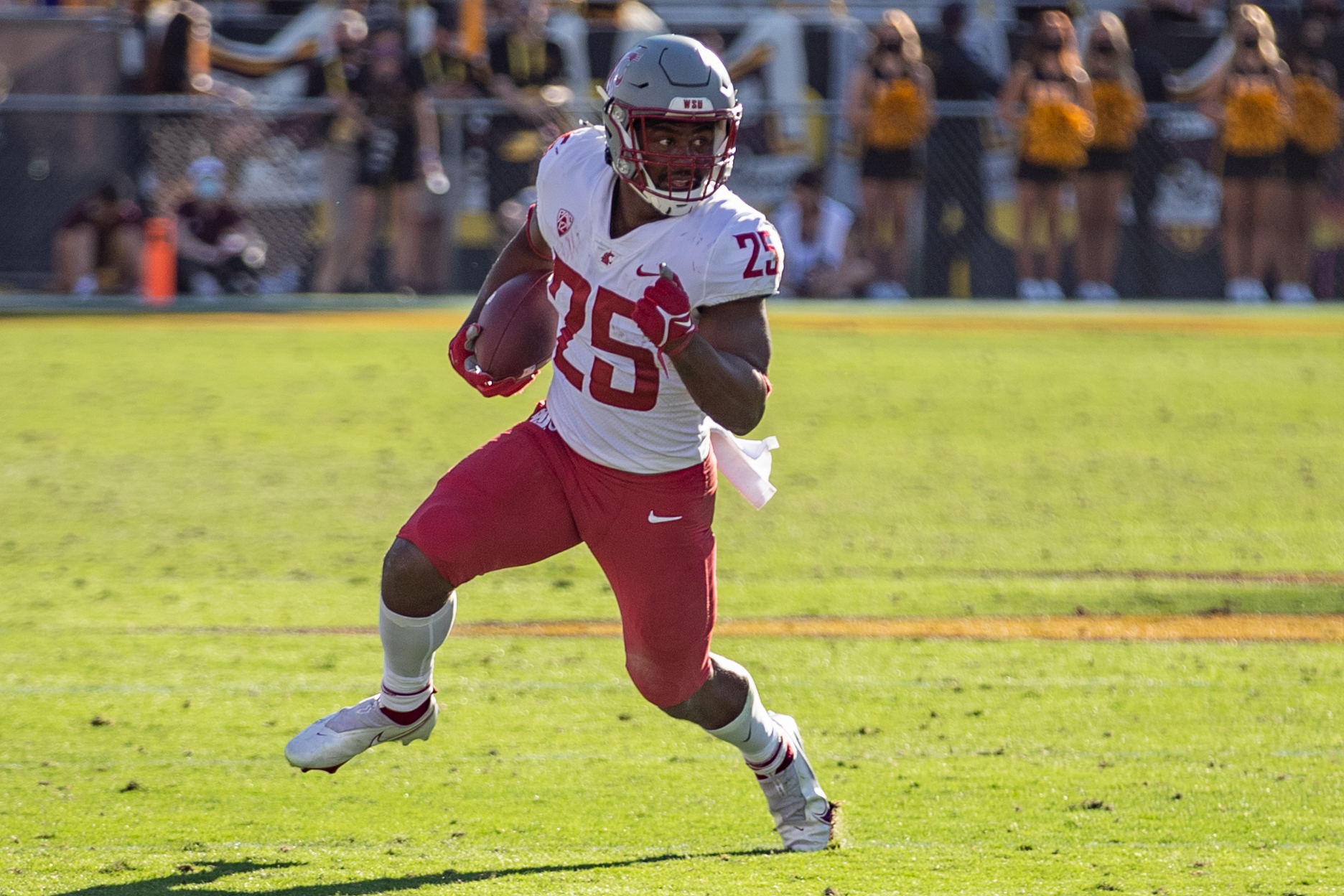 TEMPE, AZ - OCTOBER 30: Washington State running back Nakia Watson (25) runs in open space during the second half of a PAC 12 conference matchup between the Arizona State Sun Devils and the Washington State Cougars on October 30, 2021, at Sun Devil Stadium in Tempe, AZ.