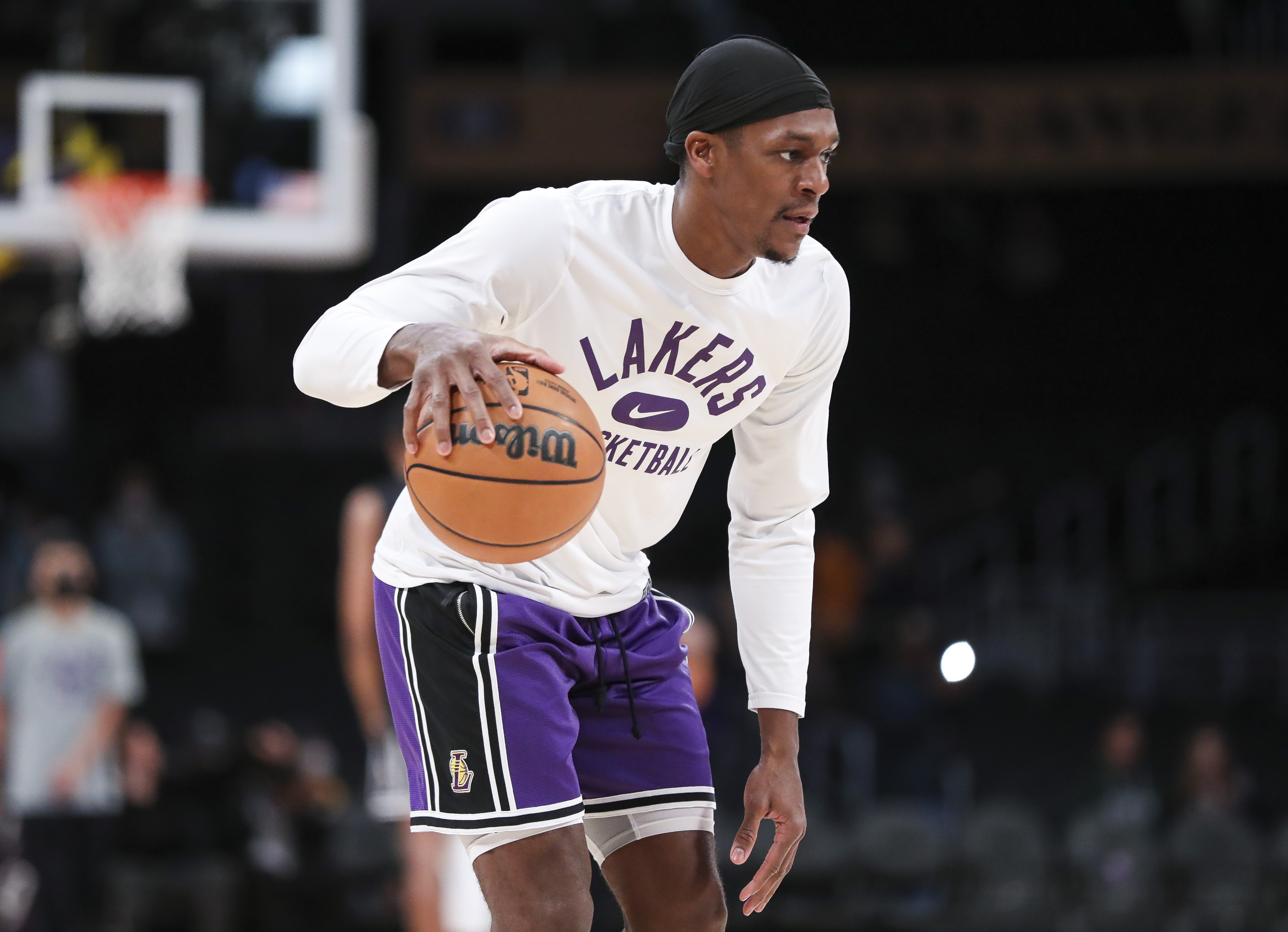 Rajon Rondo #4 of the Los Angeles Lakers warms up before the game against the Phoenix Suns at Staples Center on December 21, 2021 in Los Angeles, California.