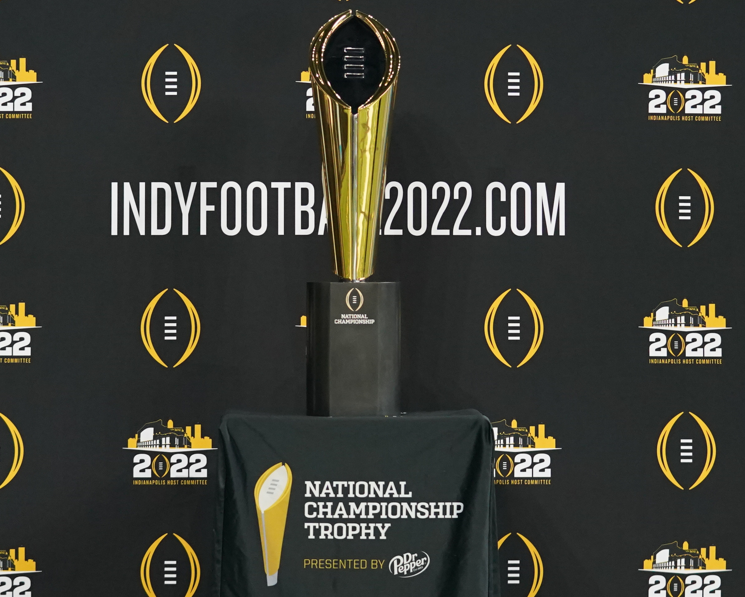 The College Football Playoff national championship trophy is displayed during Big 10 media days at Lucas Oil Stadium.