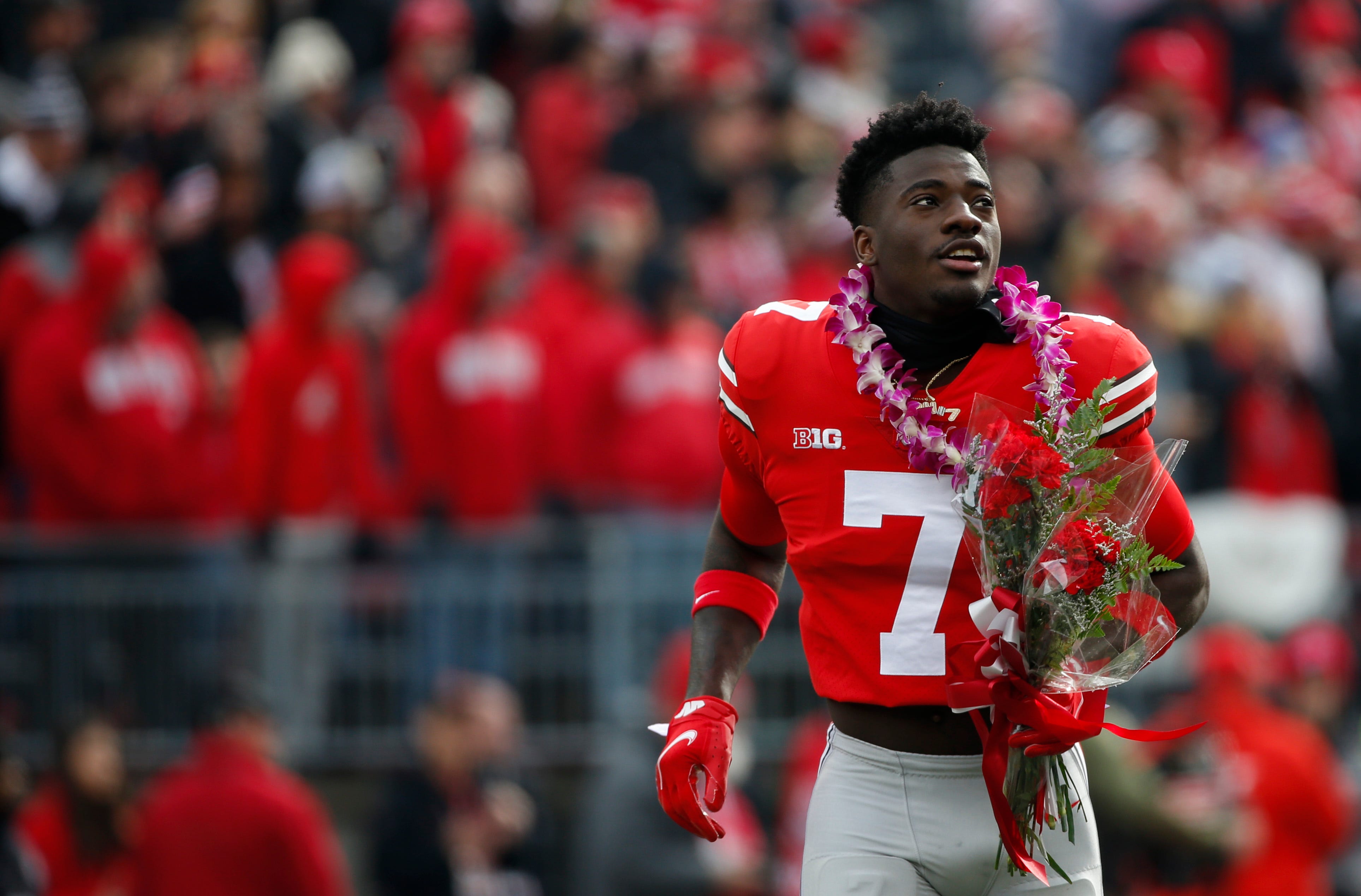 Ohio State Buckeyes cornerback Sevyn Banks looks to the stands as he runs onto the field following his Senior Day introduction before a NCAA Division I football game between the Ohio State Buckeyes and the Michigan State Spartans at Ohio Stadium.&nbsp;