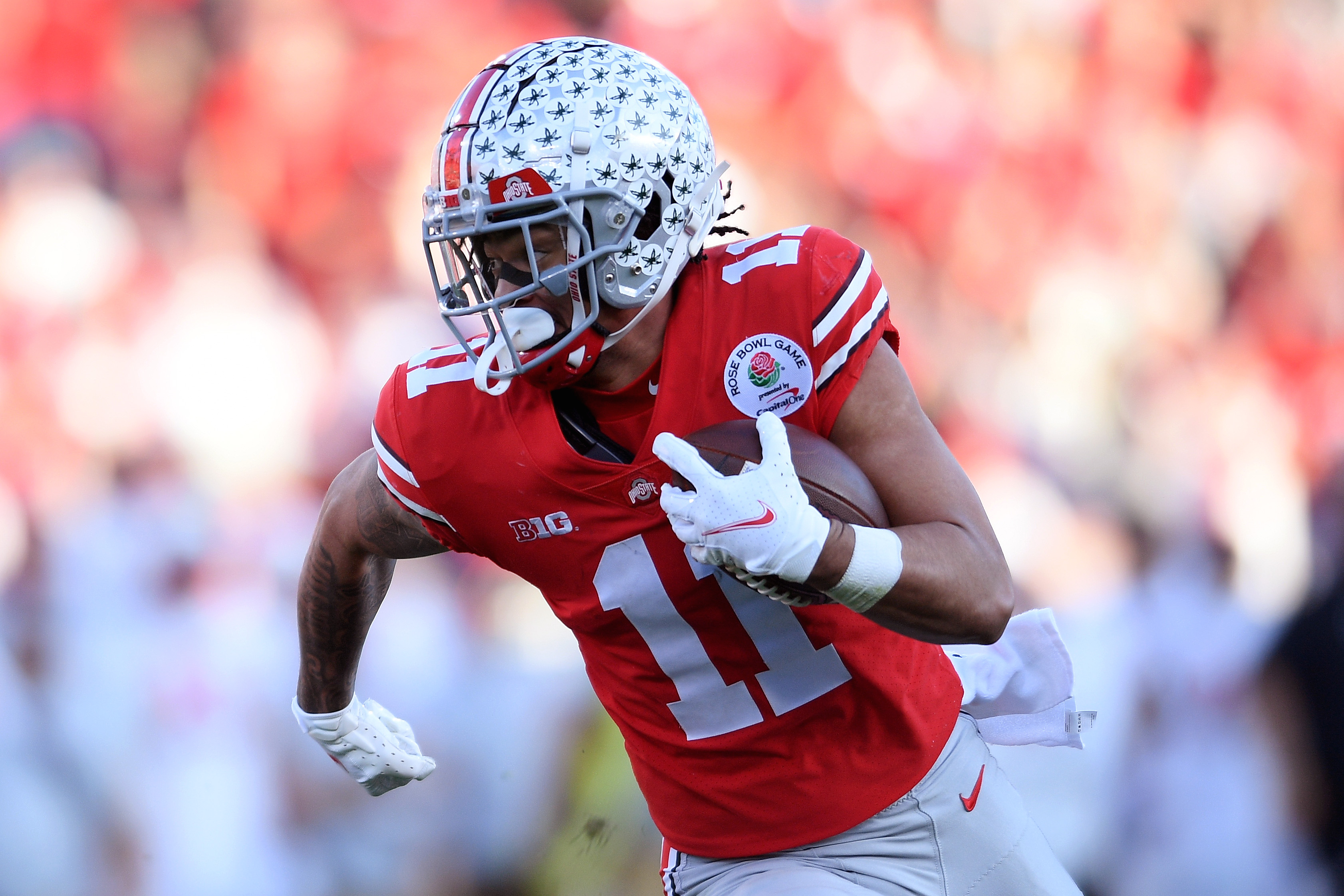 Ohio State Buckeyes wide receiver Jaxon Smith-Njigba runs in the second quarter against the Utah Utes during the 2022 Rose Bowl college football game at the Rose Bowl.&nbsp;