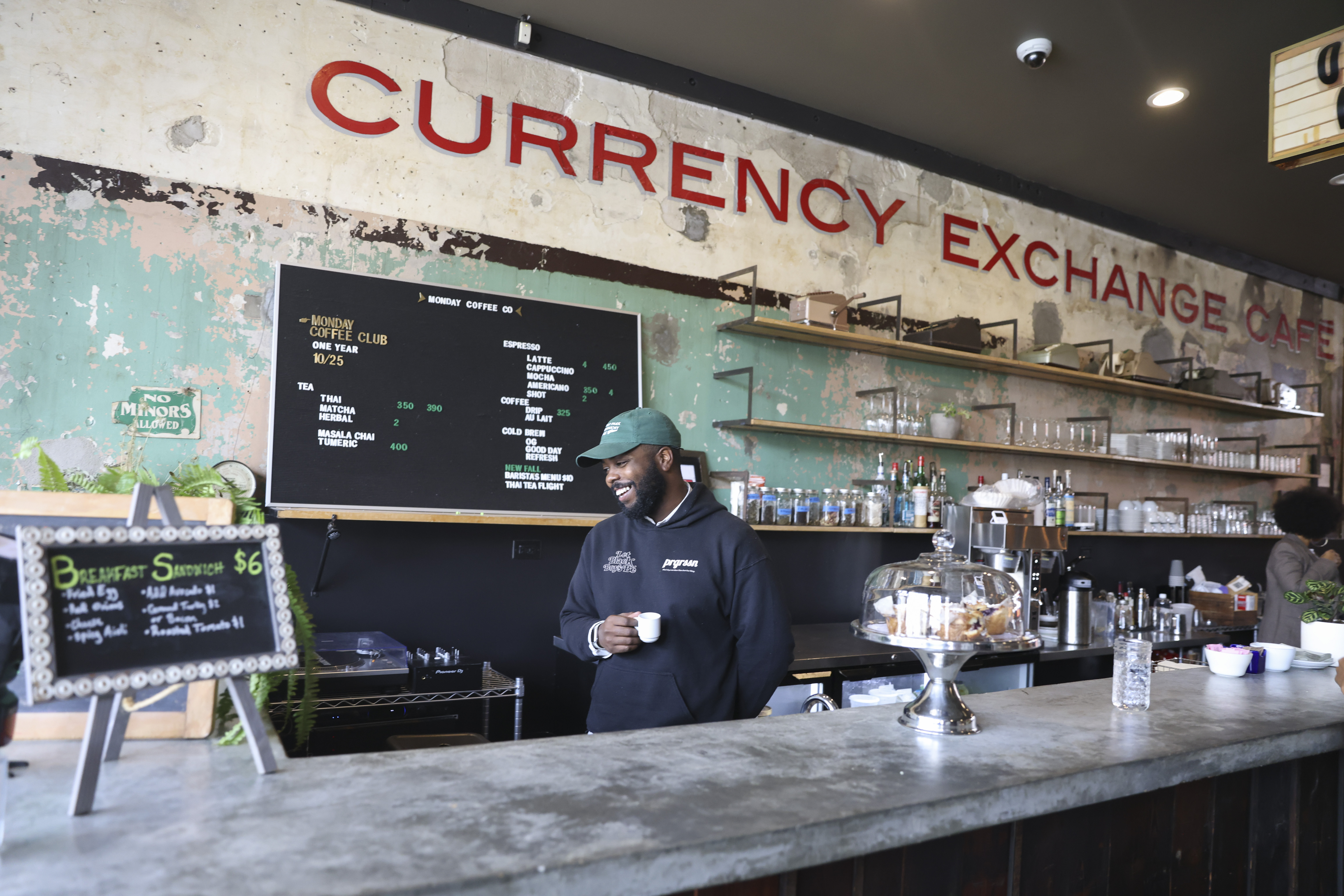 Felton Kizer, co-founder of Monday Coffee Co, at Retreat Currency Exchange in Washington Park.