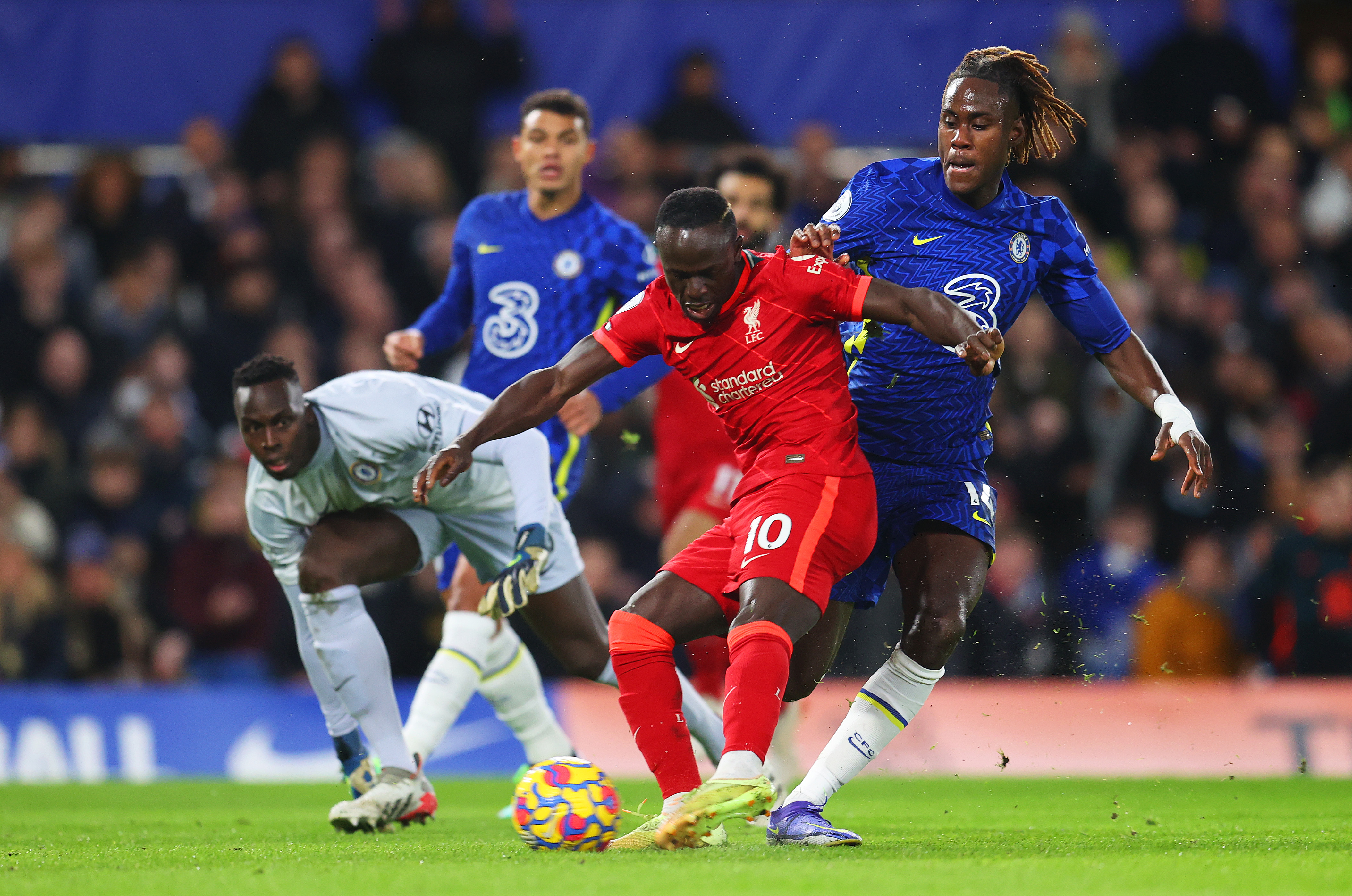 Sadio Mane of Liverpool scores their sides first goal past Edouard Mendy of Chelsea during the Premier League match between Chelsea and Liverpool at Stamford Bridge on January 02, 2022 in London, England.