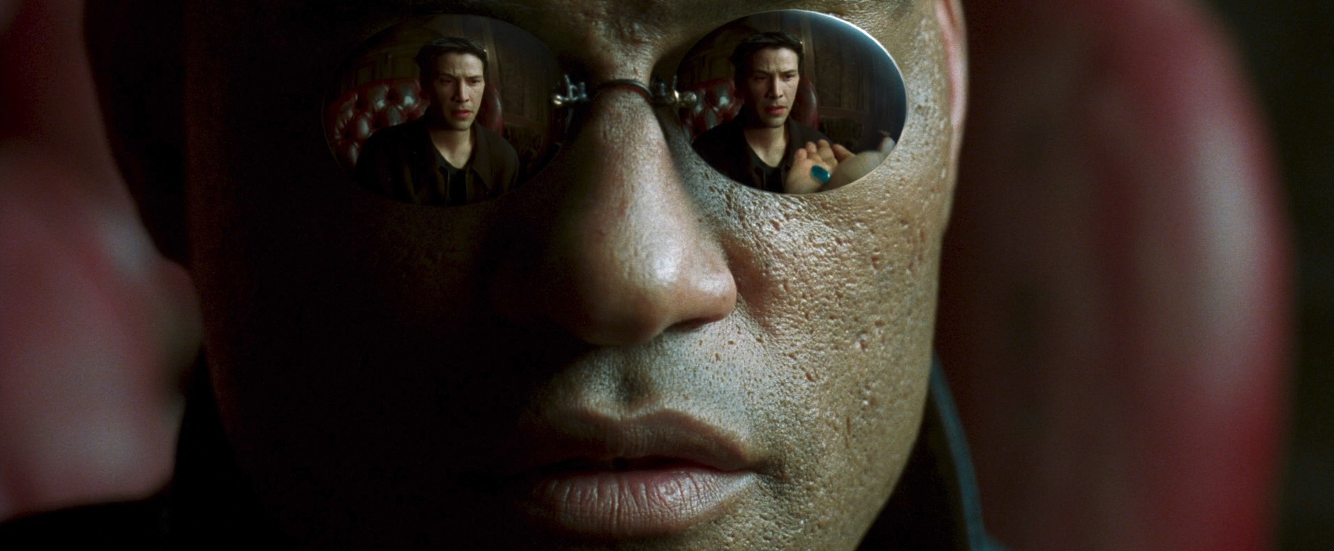 Morpheus close up on mirror sunglasses and neo picking red or blue pill in The Matrix