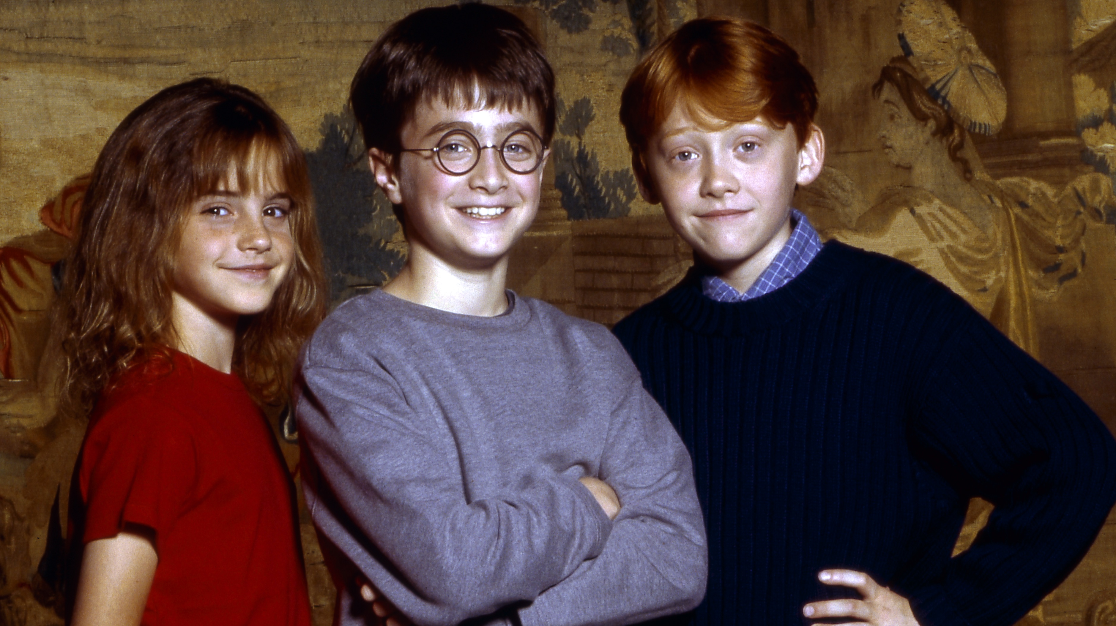Emma Watson, Daniel Radcliffe, and Rupert Grint in a 2001 publicity image for Harry Potter and the Sorcerer’s Stone, as seen in the Return to Hogwarts special