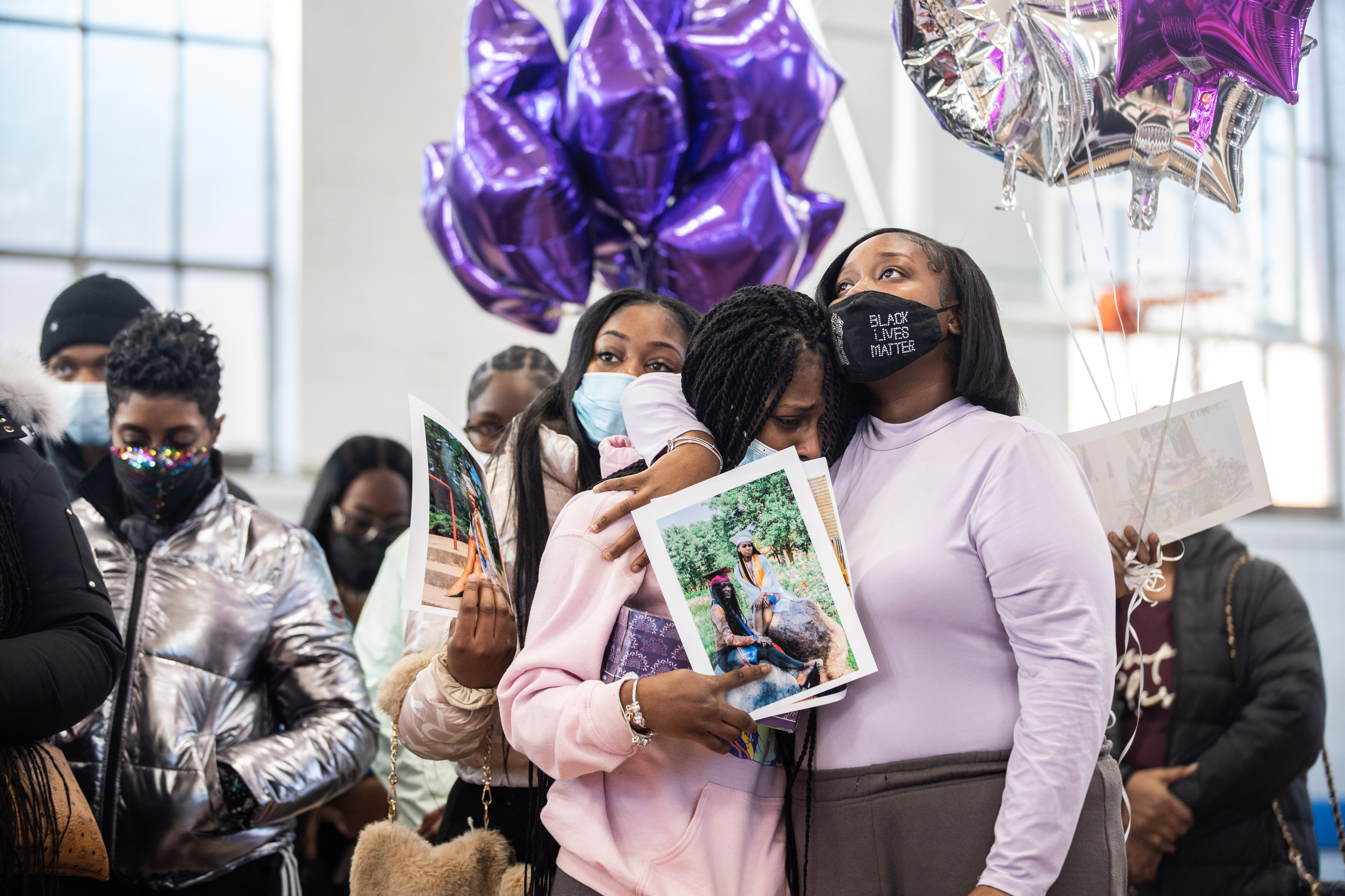 Teyonna Lofton, right, hugs Ambrosia Vasser, left, friends of activist LaNiyah Murphy, during a press conference at Ark of Saint Sabina in the Gresham neighborhood, where friends and family called for justice for Murphy, who was fatally shot in West Pullman on Jan. 4.