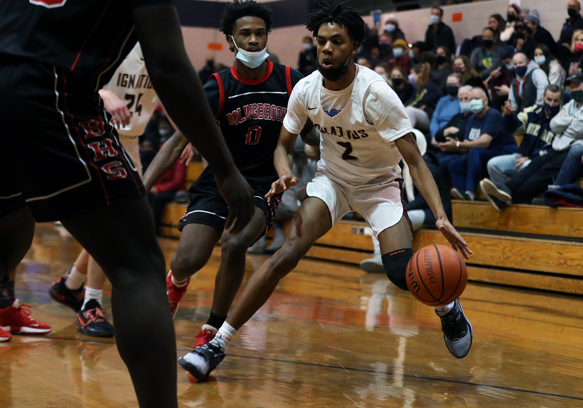 St. Ignatius’s A.J. Redd (2) controls the ball as the Wolfpack plays Bolingbrook.