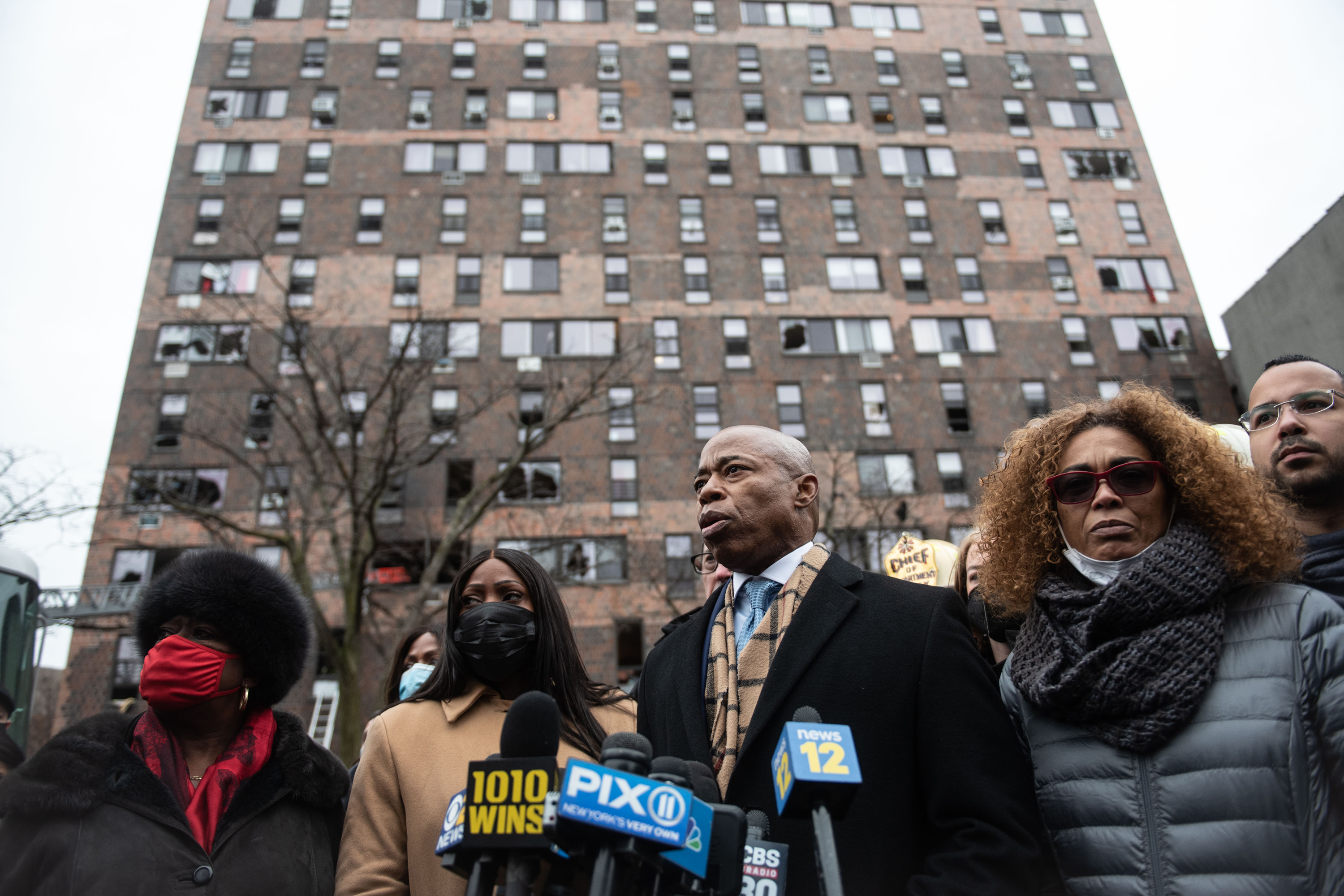 Mayor Eric Adams visit the scene of a deadly fire on East 181st Street in the Bronx, January 9, 2022.