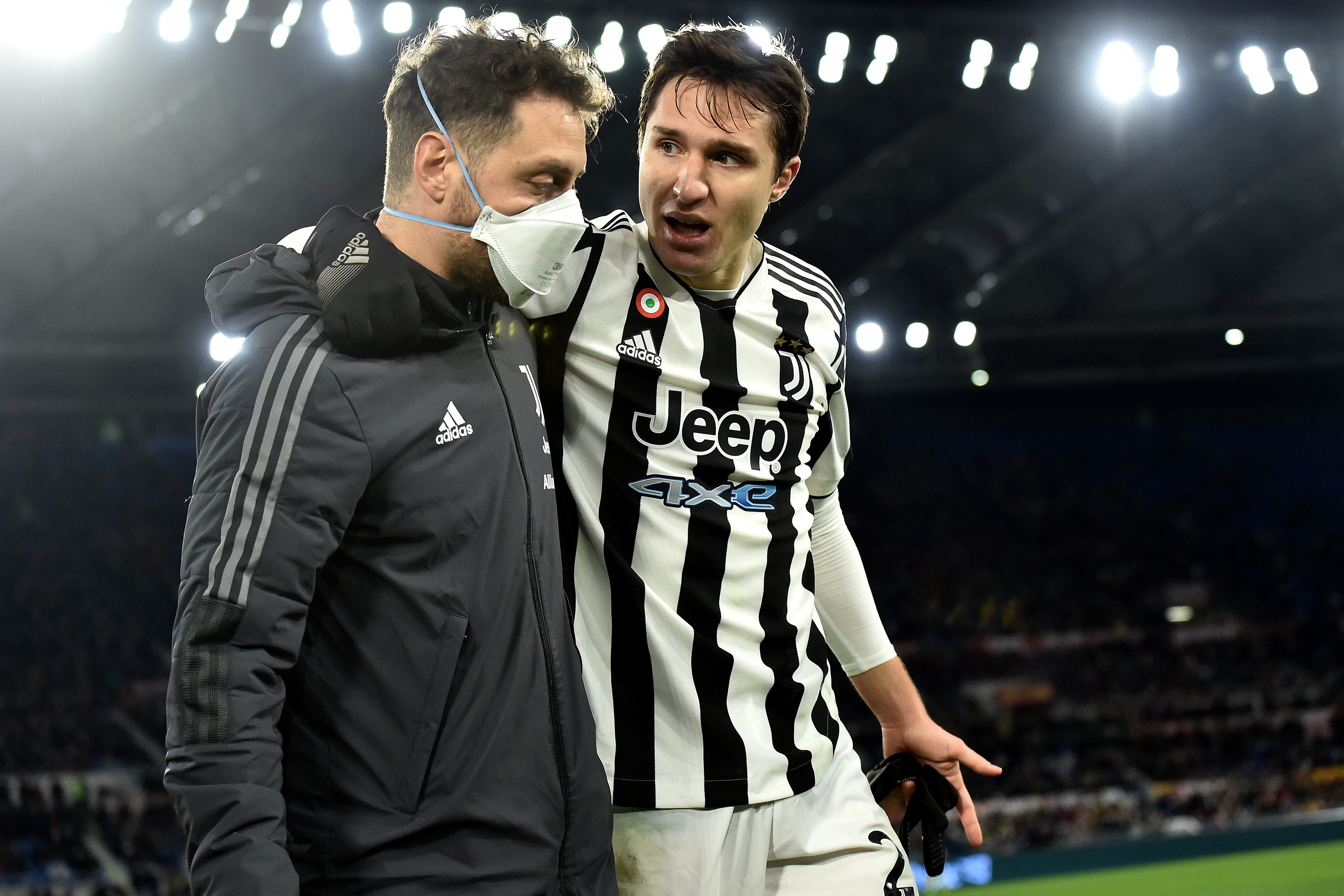 Federico Chiesa of Juventus FC leaves the pitch injured...