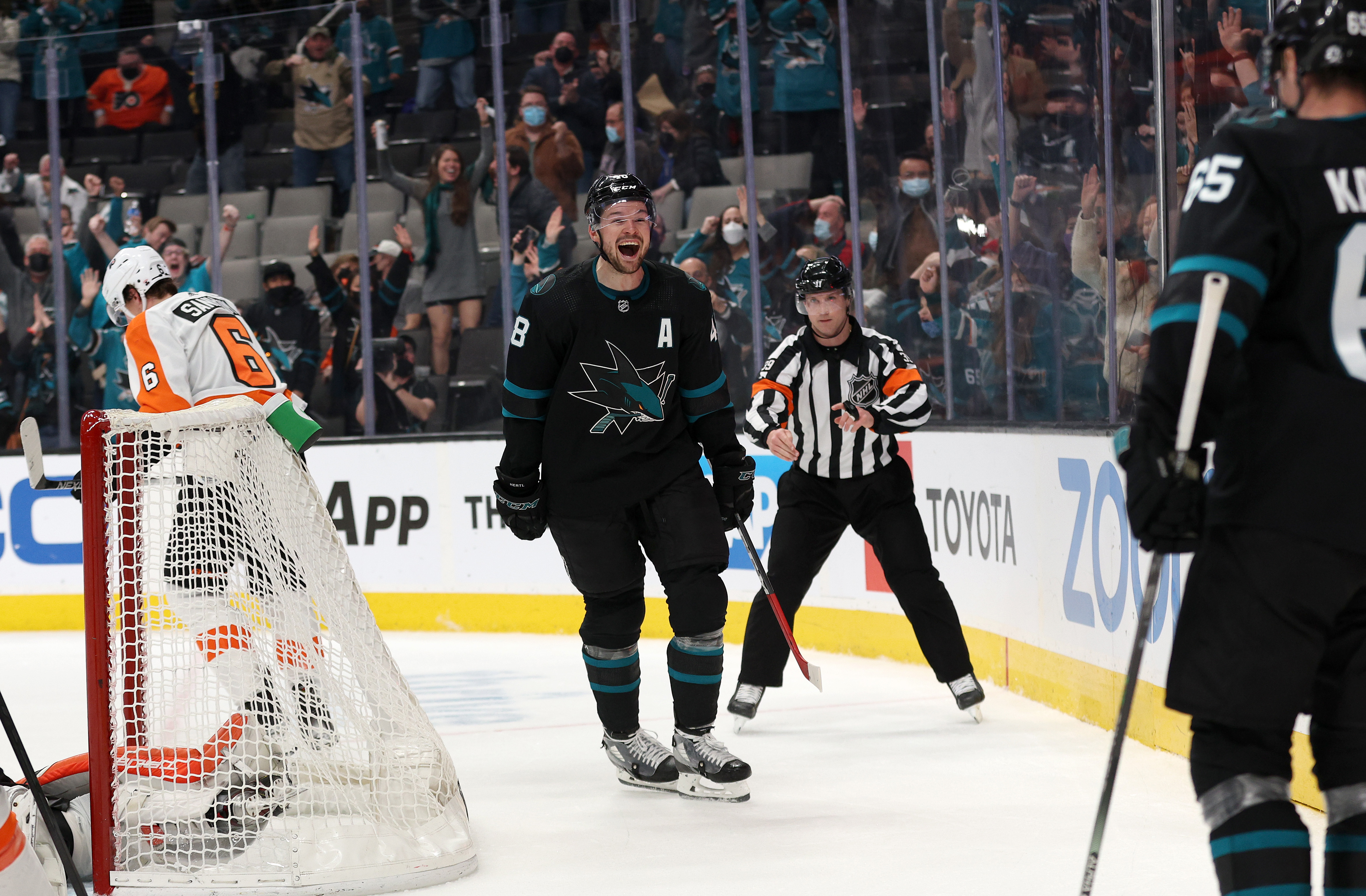 Tomas Hertl #48 of the San Jose Sharks reacts after he scored the winning goal on Felix Sandstrom #32 of the Philadelphia Flyers in overtime at SAP Center on December 30, 2021 in San Jose, California.