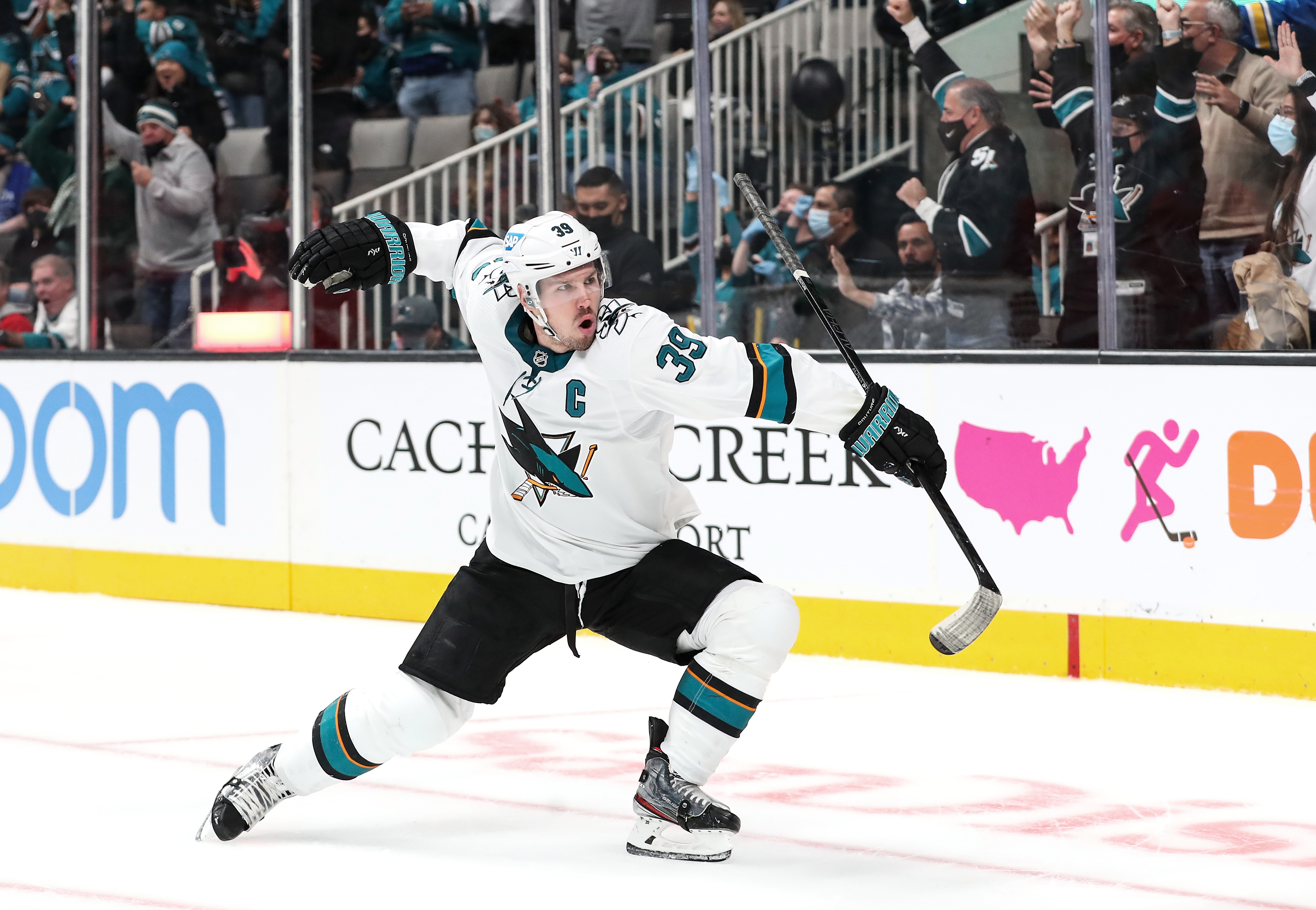 Logan Couture #39 of the San Jose Sharks celebrates scoring the game-winning goal in overtime against the Detroit Red Wings at SAP Center on January 11, 2022 in San Jose, California.
