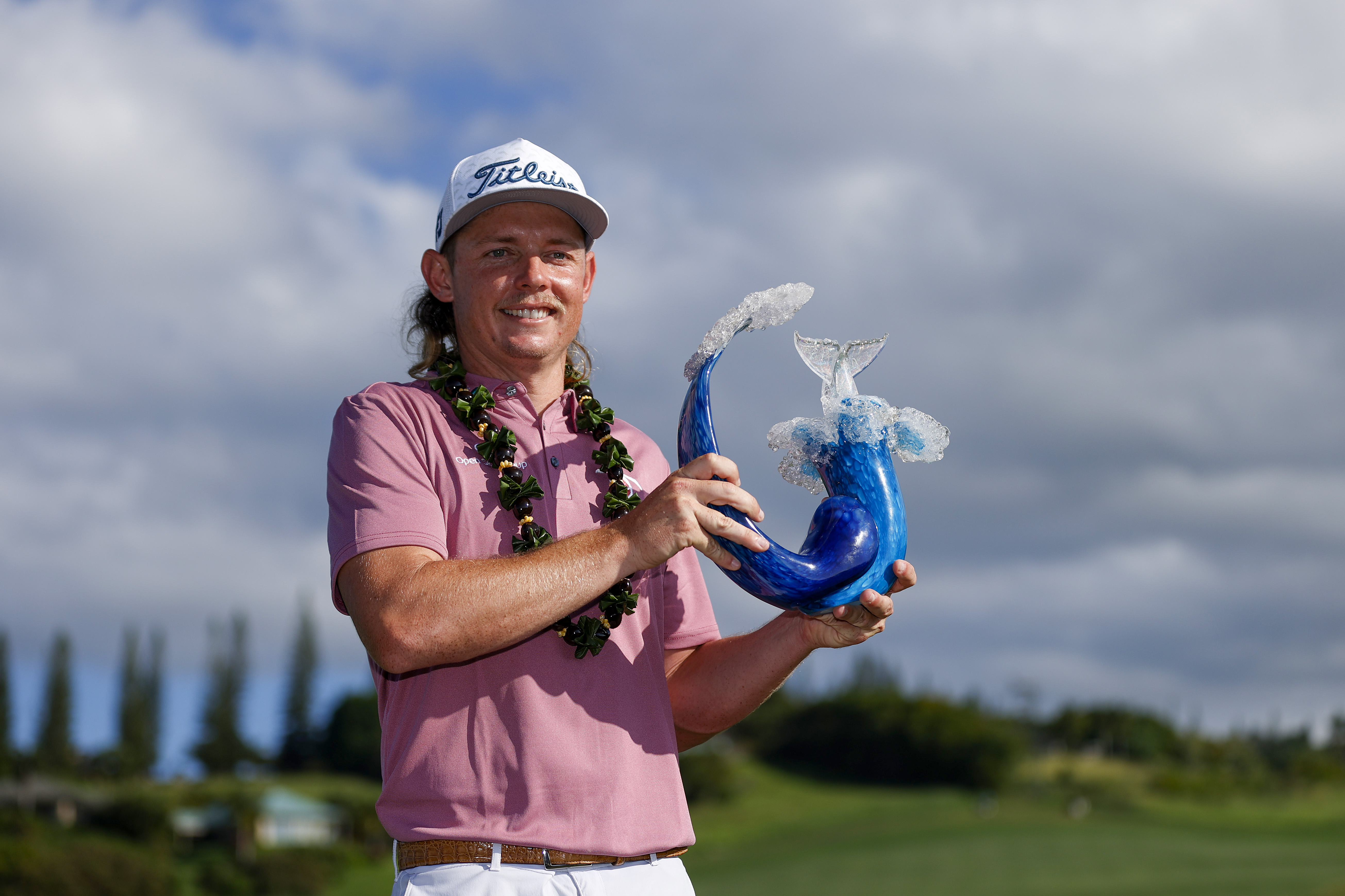 Cameron Smith of Australia celebrates with the trophy after winning during the final round of the Sentry Tournament of Champions at the Plantation Course at Kapalua Golf Club on January 09, 2022 in Lahaina, Hawaii.