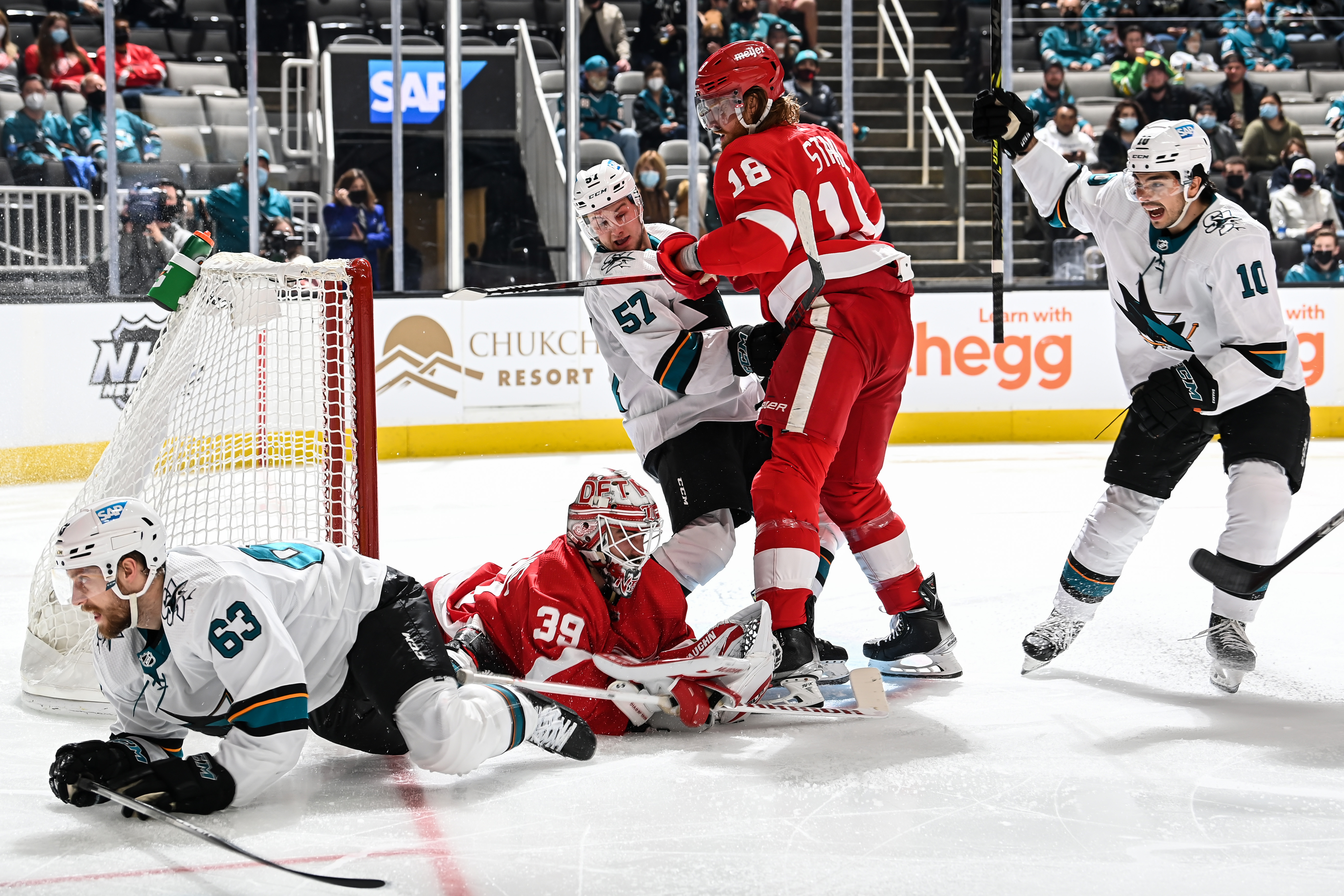 Jeffrey Viel #63 of the San Jose Sharks scores a goal against Alex Nedeljkovic #39 of the Detroit Red Wings in a regular season game at SAP Center on January 11, 2022 in San Jose, California.