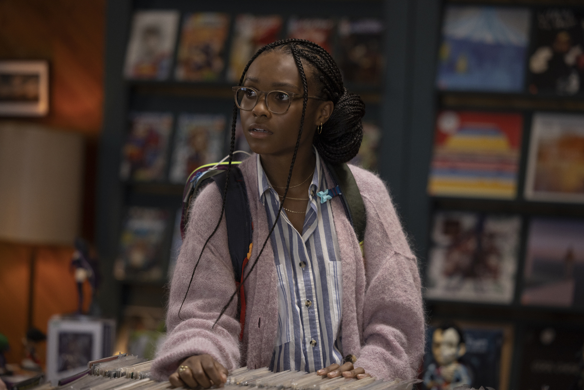 Naomi series star Kaci Walfall, in a comic-book shop