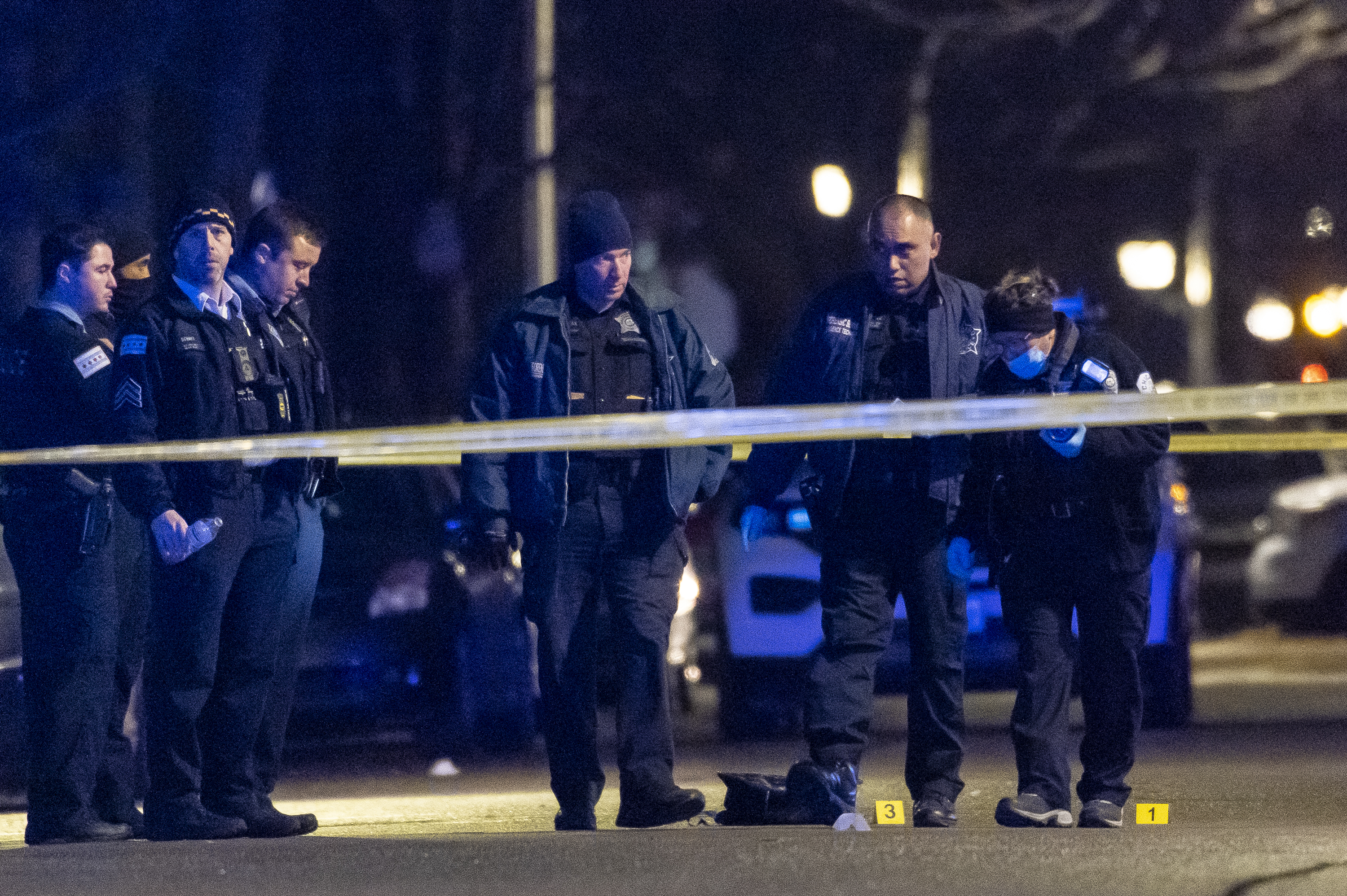 Chicago police work the scene where a 14-year-old boy was shot and killed in the 2200 block of W. Adams St. on the Near West Side, Wednesday, Jan. 12, 2021. 
