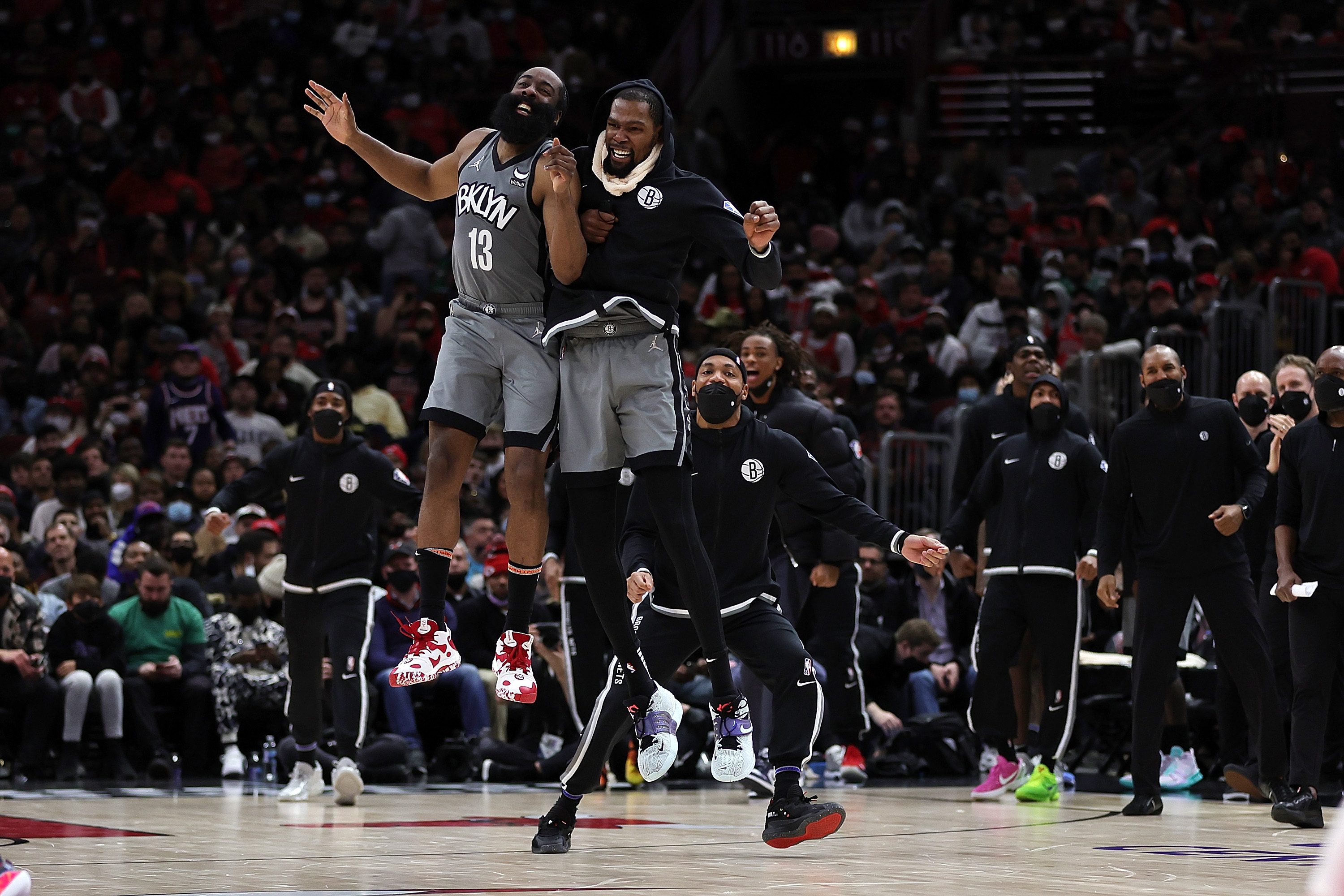 The Nets’ James Harden and Kevin Durant celebrate after a score during the second half of Brooklyn’s win over the Bulls Wednesday night at the United Center.