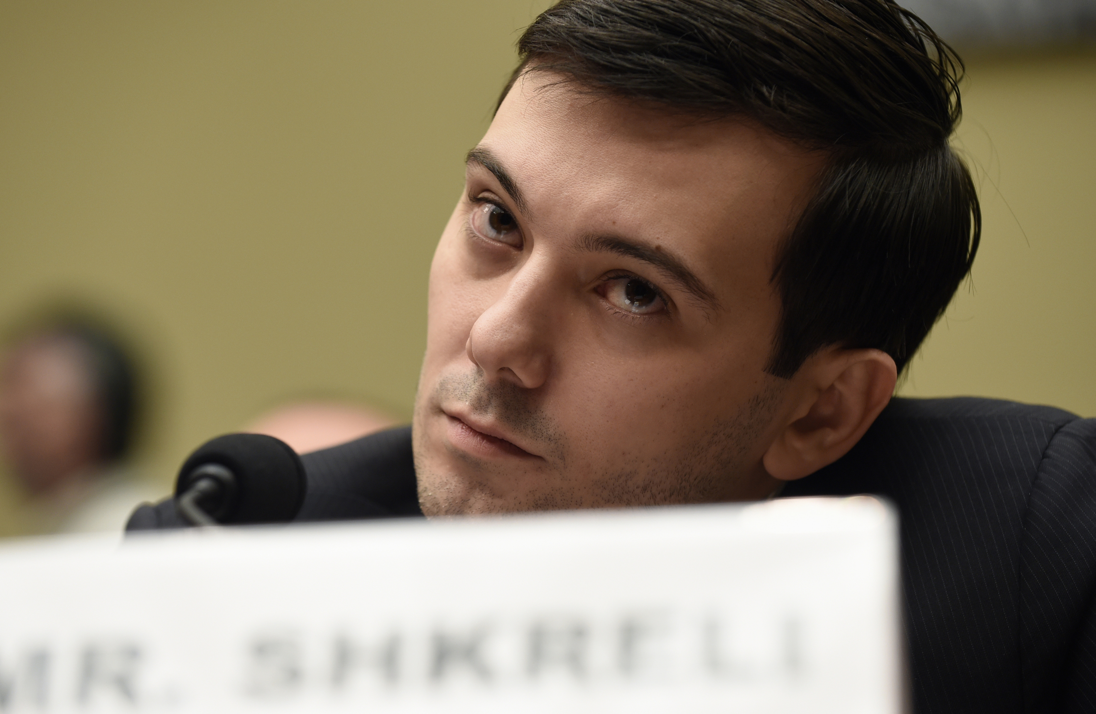 Former Turing Pharmaceuticals CEO Martin Shkreli attends the House Committee on Oversight and Reform Committee hearing on Capitol Hill in Washington, Feb. 4, 2016. A federal judge on Friday, Jan. 14, 2022 ordered Shkreli to return $64.6 million in profits he and his company reaped from inflating the price of the life-saving drug Daraprim and barred him from participating in the pharmaceutical industry for the rest of his life.