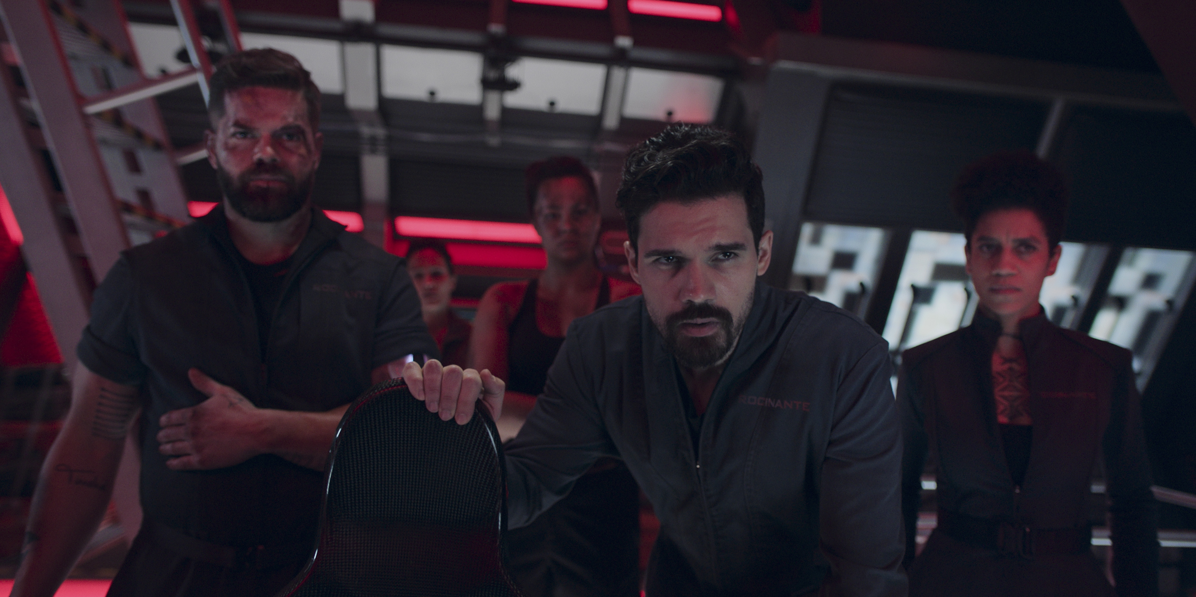 The crew of the Rocinante staring at the camera in a still from the final season of The Expanse