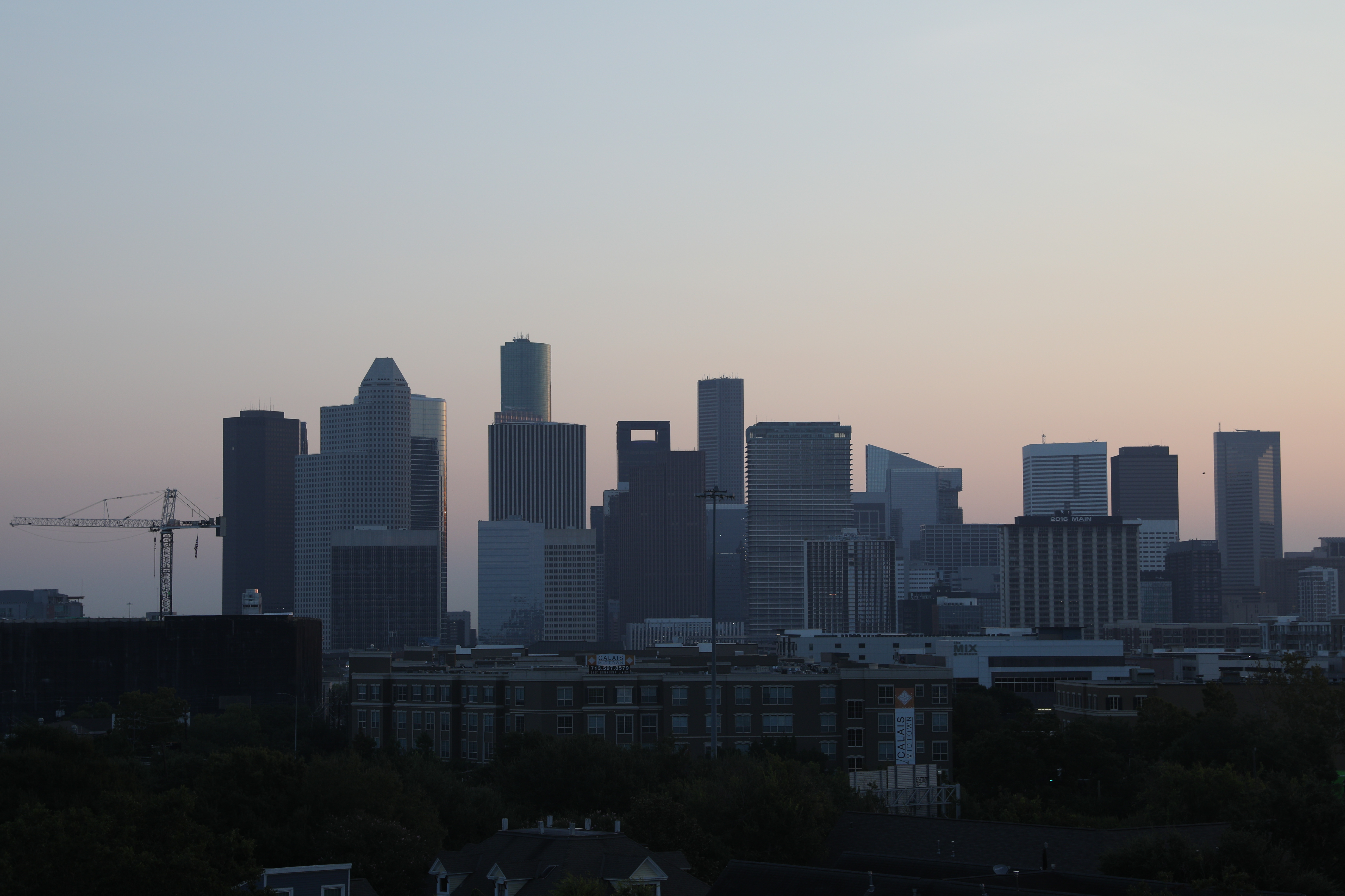 The downtown skyline is pictured as the sun rises on August 25, 2018 in Houston, Texas.