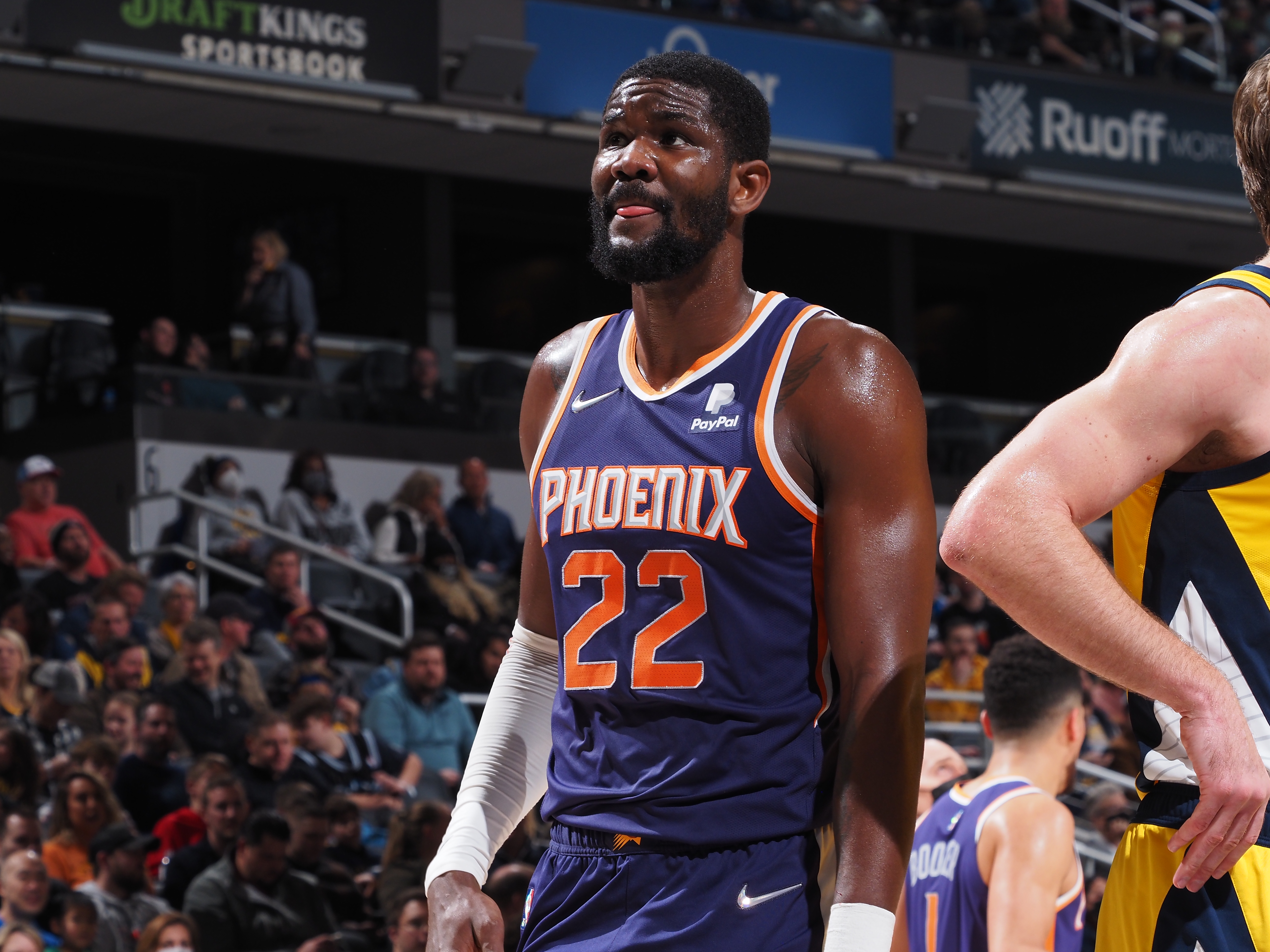 Deandre Ayton #22 of the Phoenix Suns looks on during the game against the Indiana Pacers on January 14, 2022 at Gainbridge Fieldhouse in Indianapolis, Indiana.