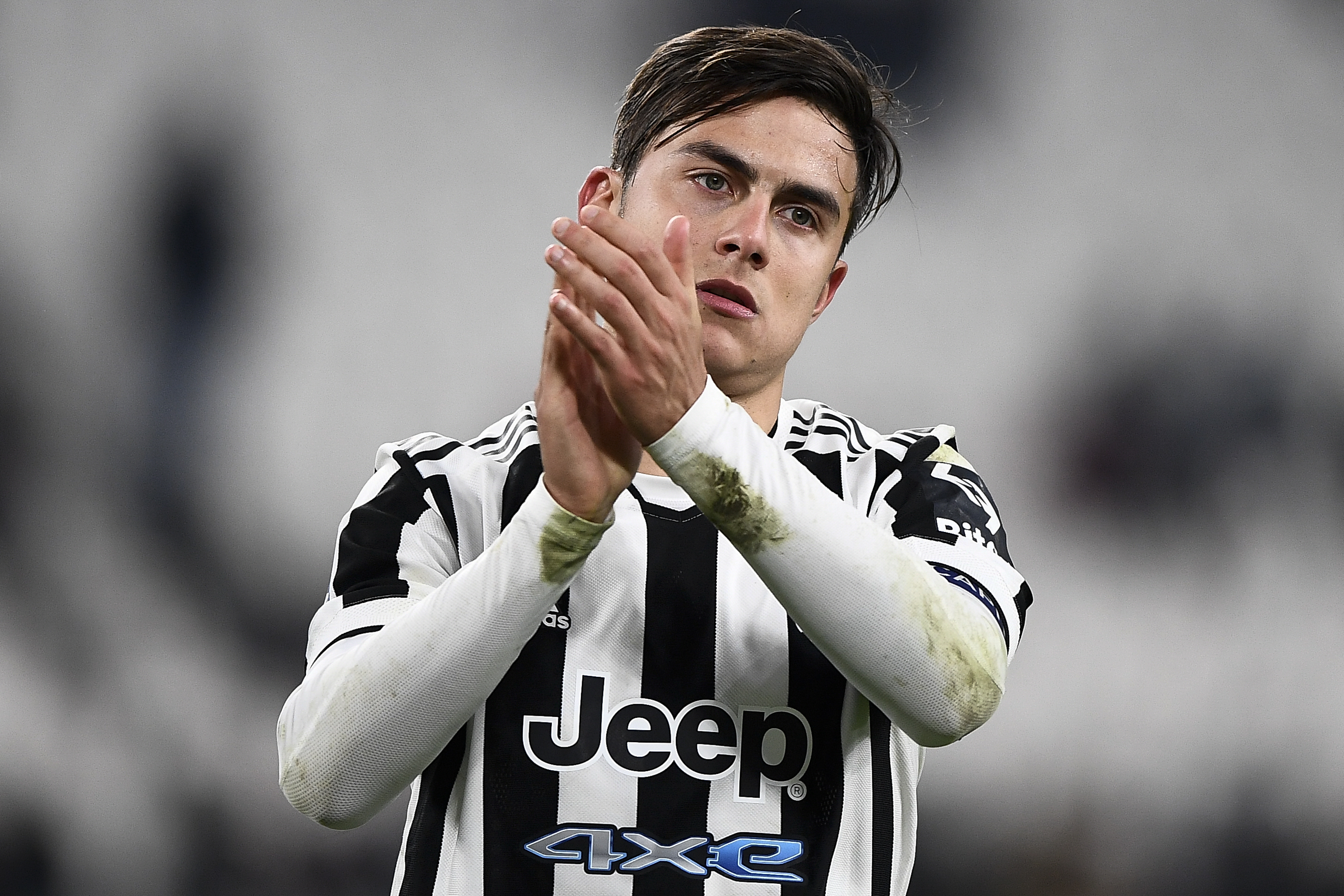Paulo Dybala of Juventus FC greets the fans at the end of...