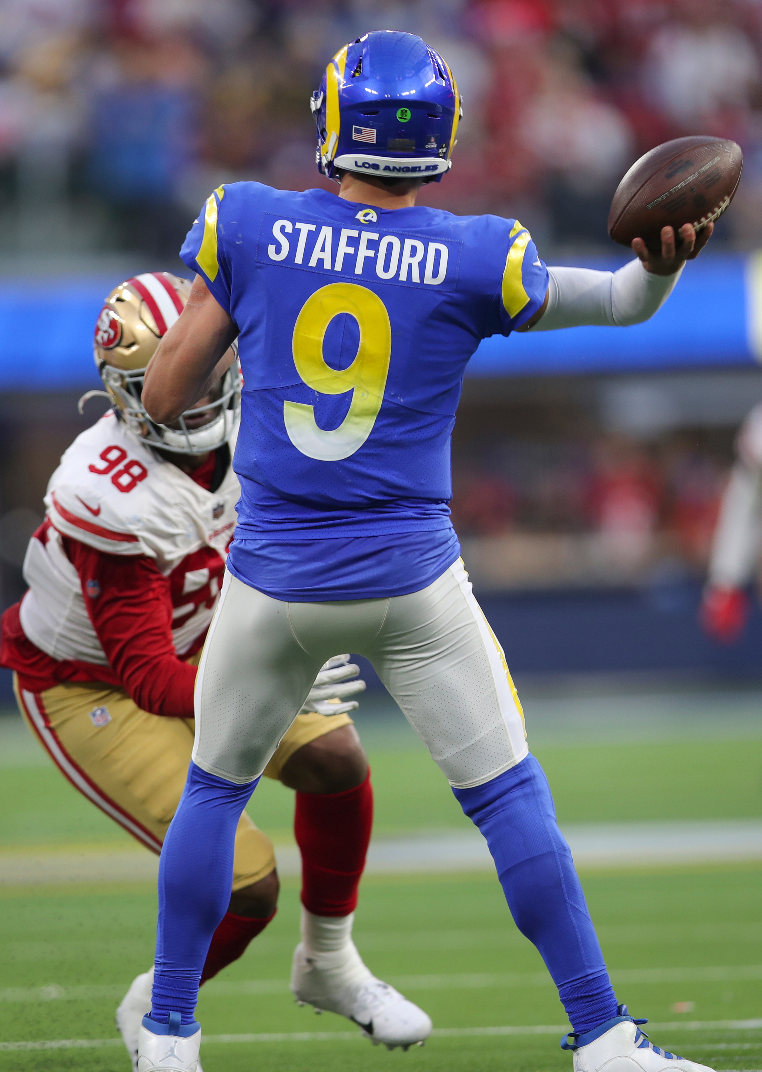 Matthew Stafford #9 of the Los Angeles Rams passes during the game against the San Francisco 49ers at SoFi Stadium on January 9, 2022 in Inglewood, California. The 49ers defeated the Rams 27-24.