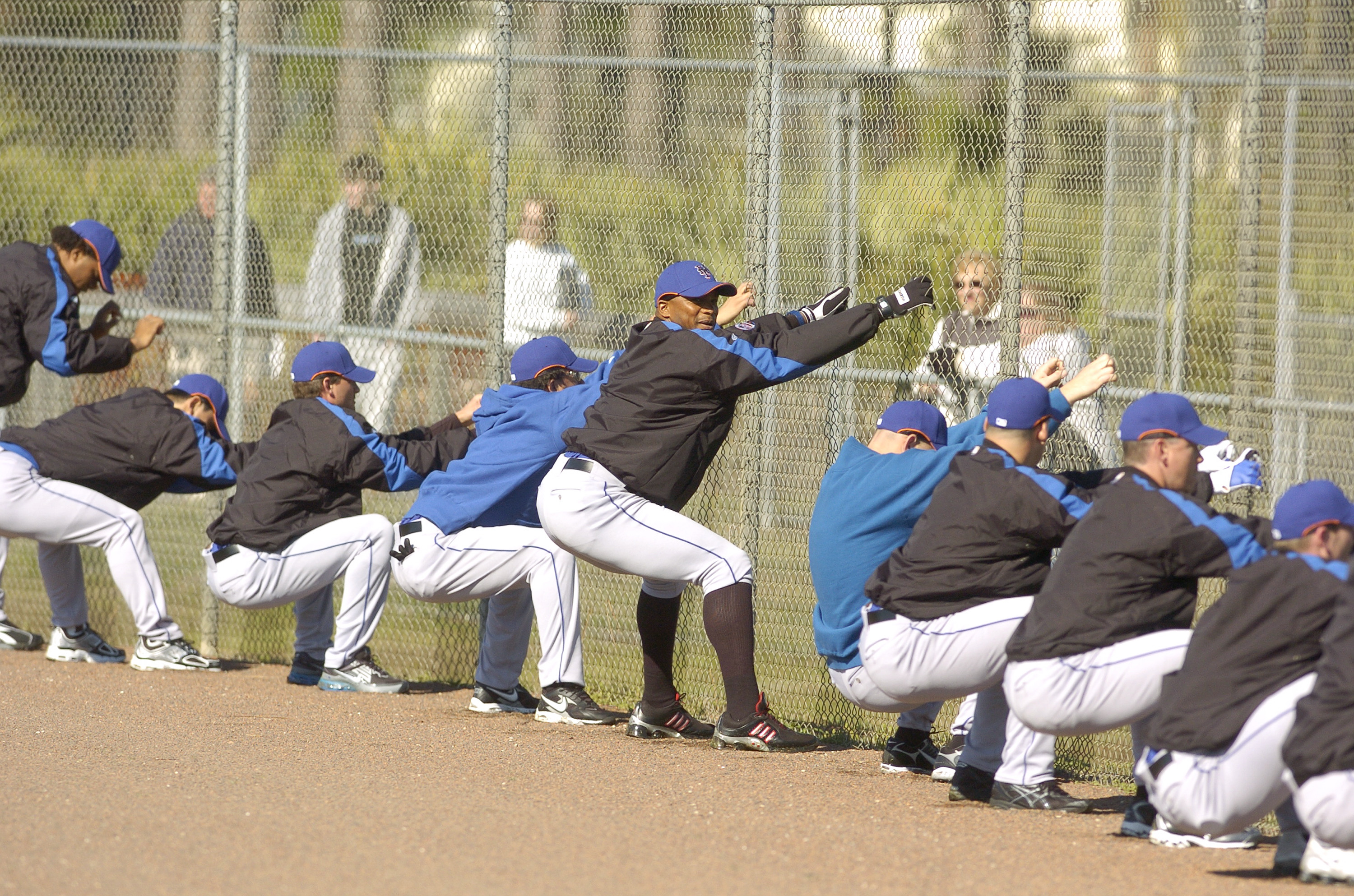 New York Mets’ pitcher Orlando Hernandez (center) stretches