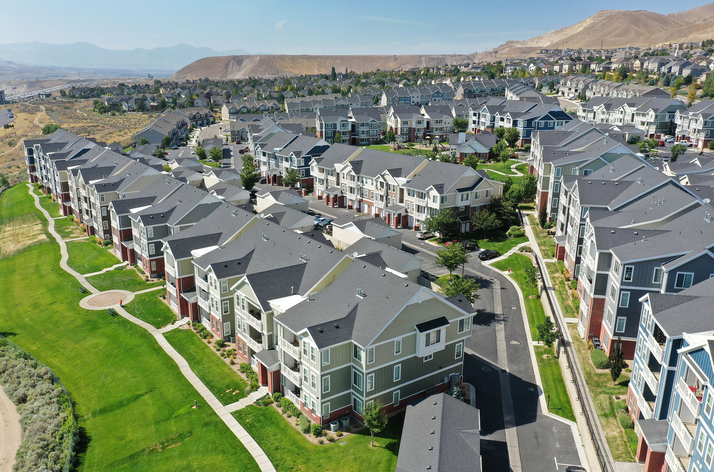 Apartments and town houses on Traverse Mountain Boulevard in Lehi are pictured on Aug. 11, 2021.