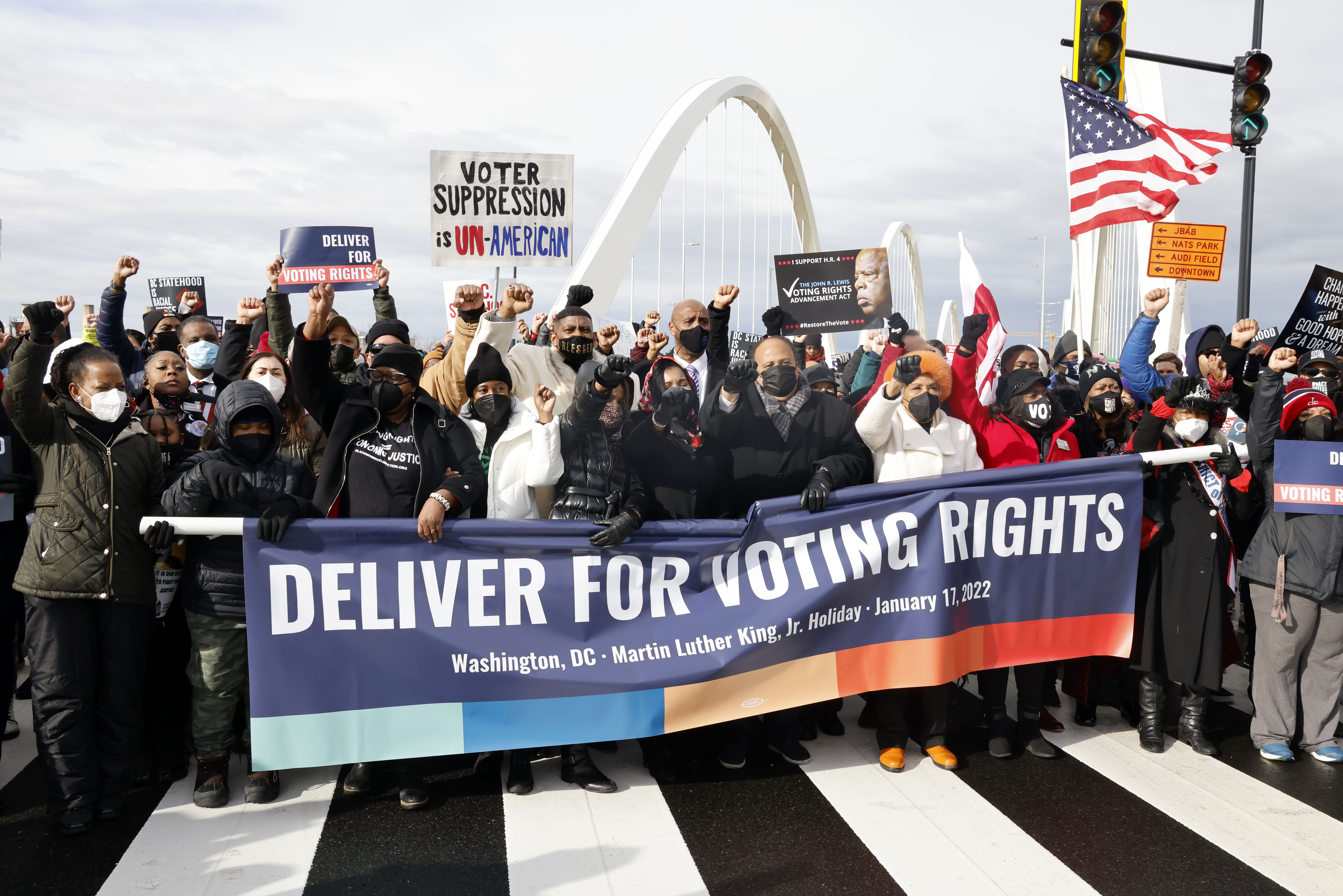 Martin Luther King III, center, and his family are joined by members of Congress and others on MLK Day to march for voting rights legislation in Washington, D.C.