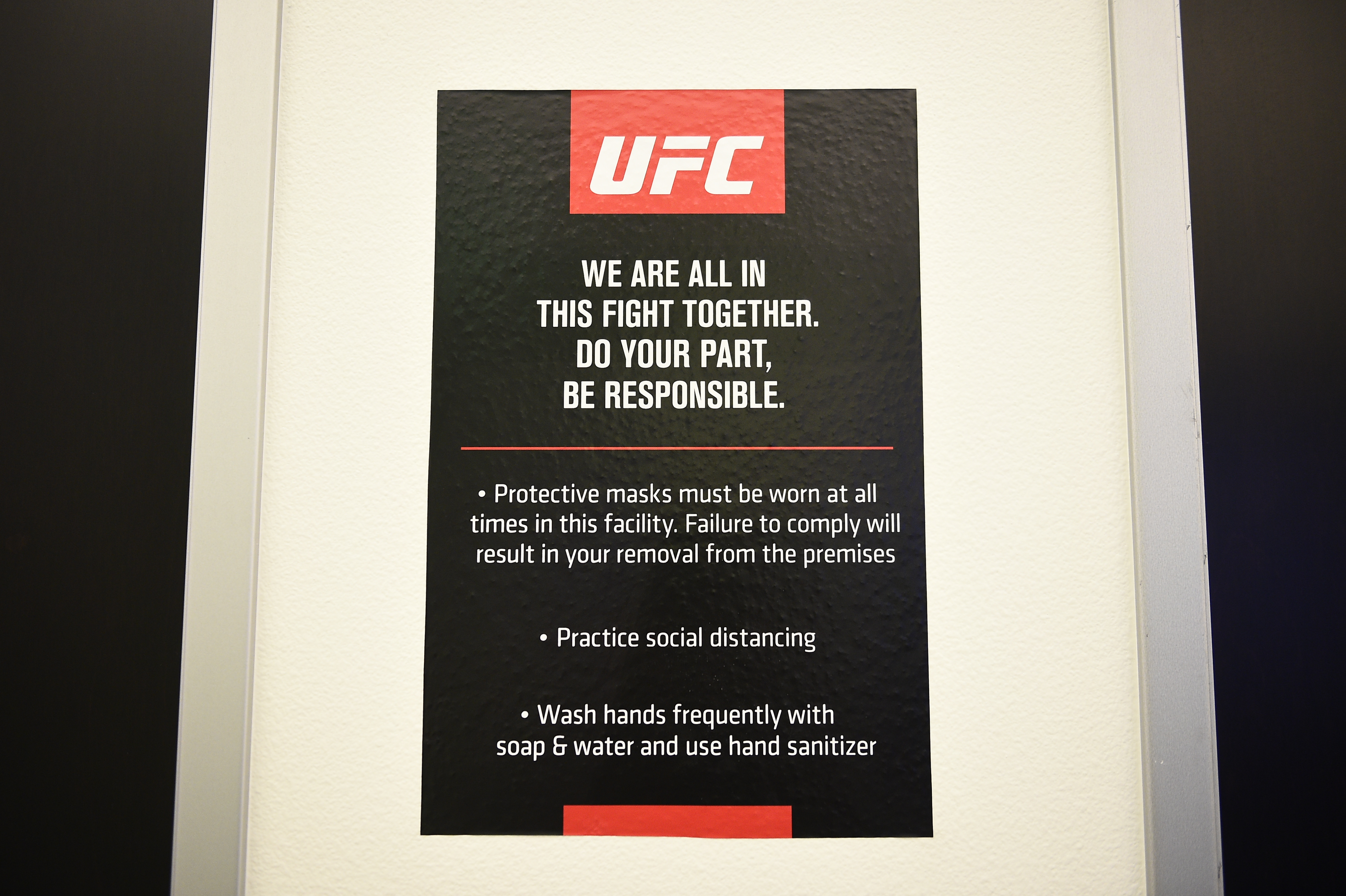A sign encouraging safe practices to prevent COVID-19 spread is seen backstage during the UFC Fight Night event at UFC APEX on September 05, 2020 in Las Vegas, Nevada.