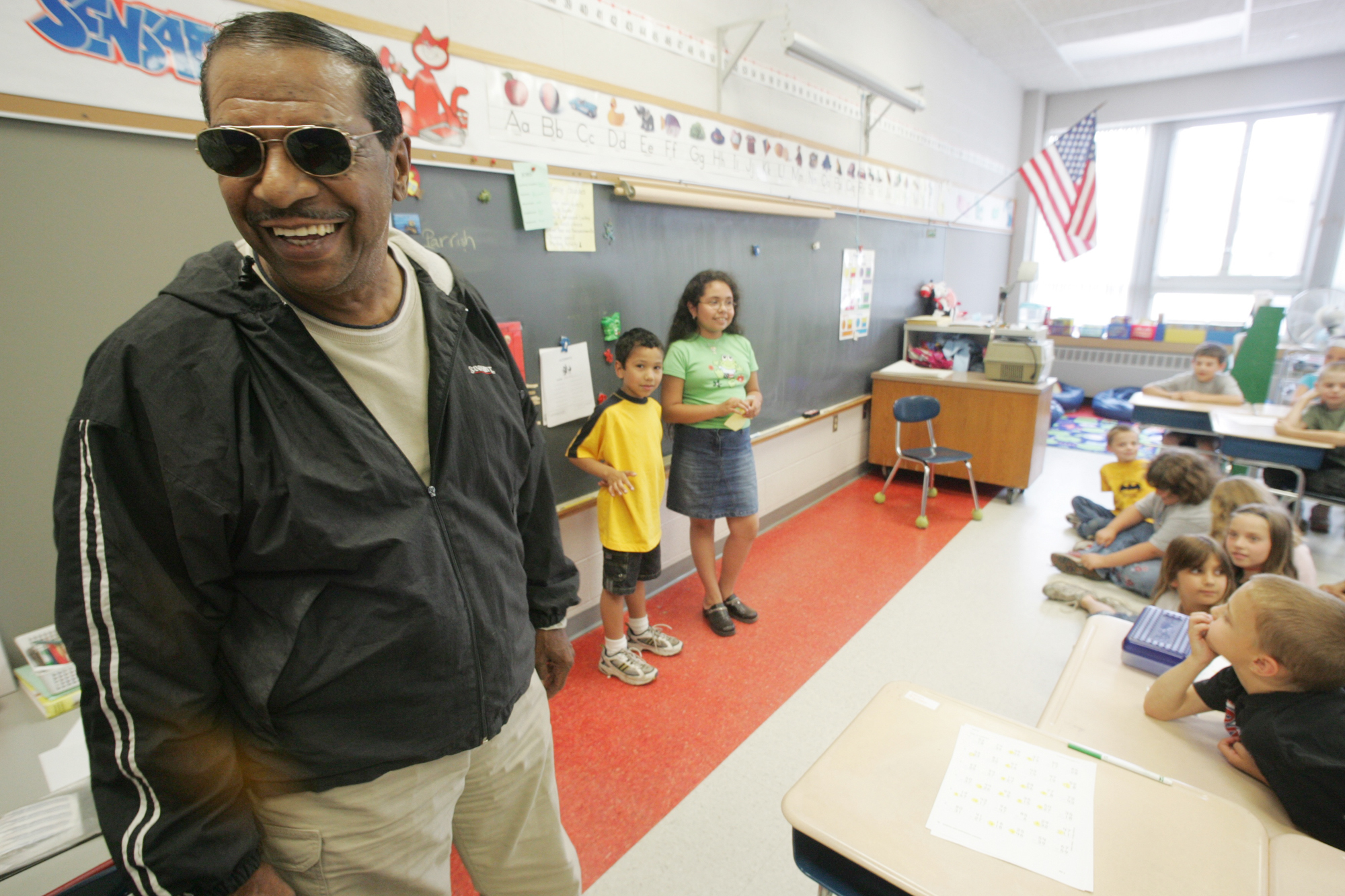 Singer Fred Parris, famous for singing “In the Still of the Night,” with the 1950s harmony group The Five Satins, visits Hanover Elementary School in Meriden, Connecticut, on June 16, 2005. Parris died Jan. 13 after a brief illness. He was 85.