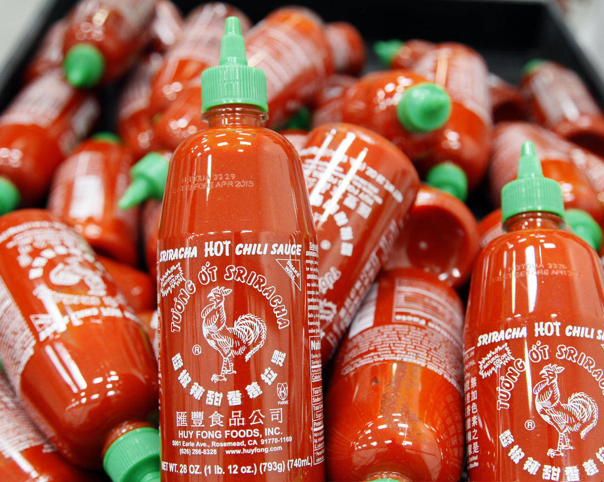 Sriracha chili sauce bottles.