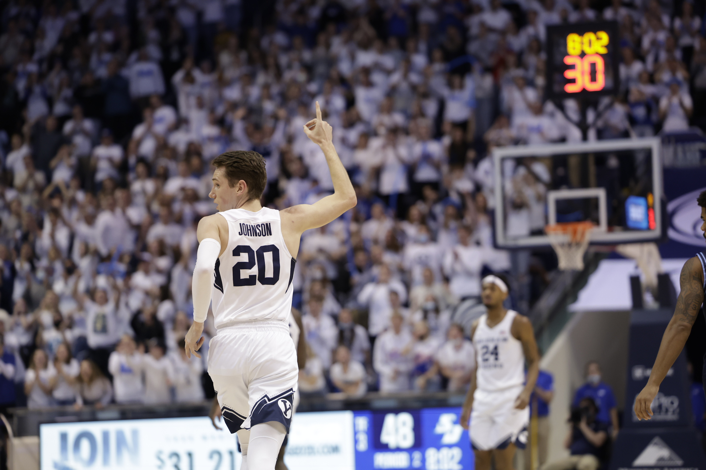 BYU guard Spencer Johnson celebrates as BYU and San Diego play at the Marriott Center on Thursday, Jan. 20, 2022. 
