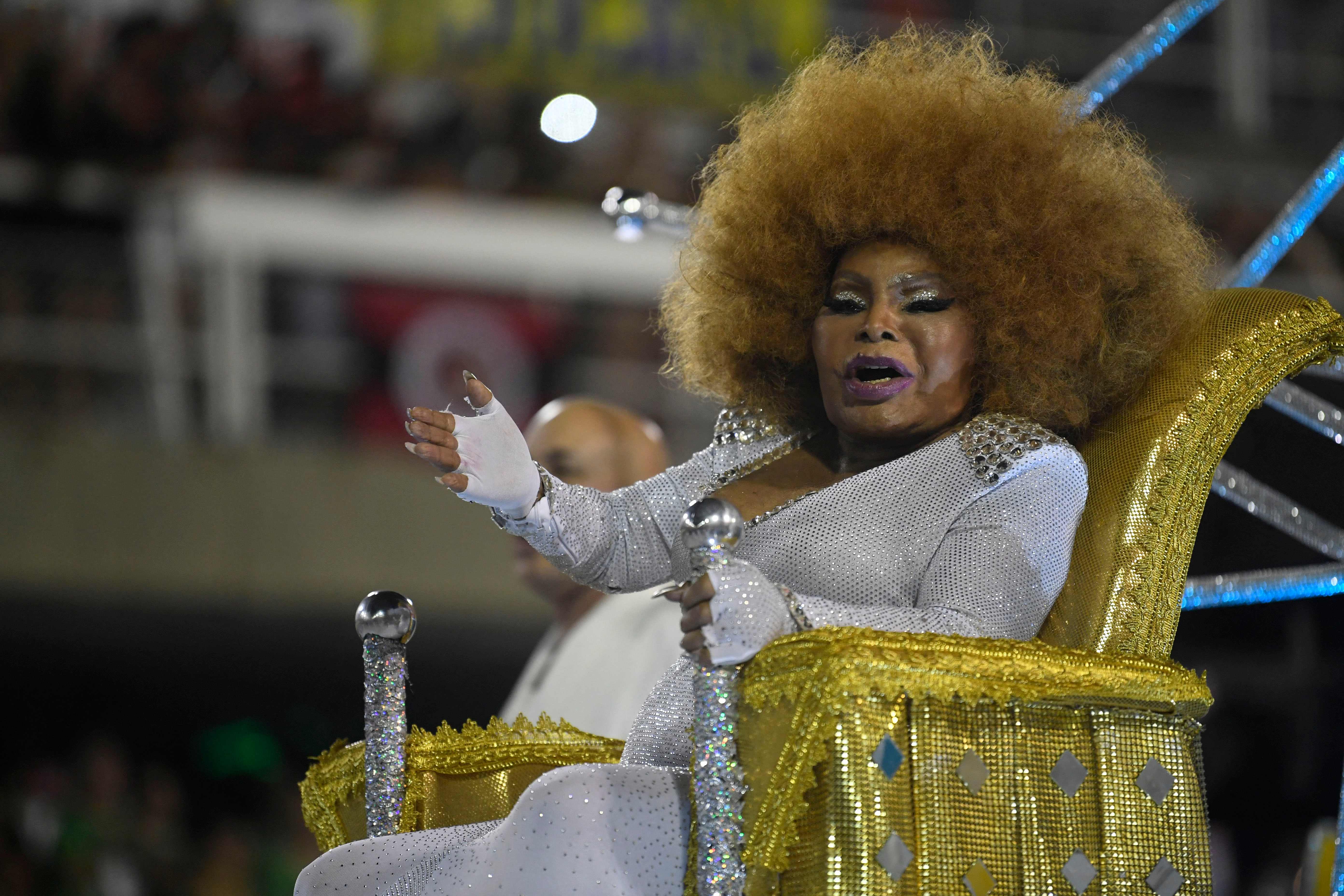 In this file photo taken on February 25, 2020,  Brazilian singer Elza Soares attends the parade of Mocidade Independente de Padre Miguel samba school during the last night of Rio’s Carnival parade at the Sambadrome Marques de Sapucai in Rio de Janeiro, Brazil.