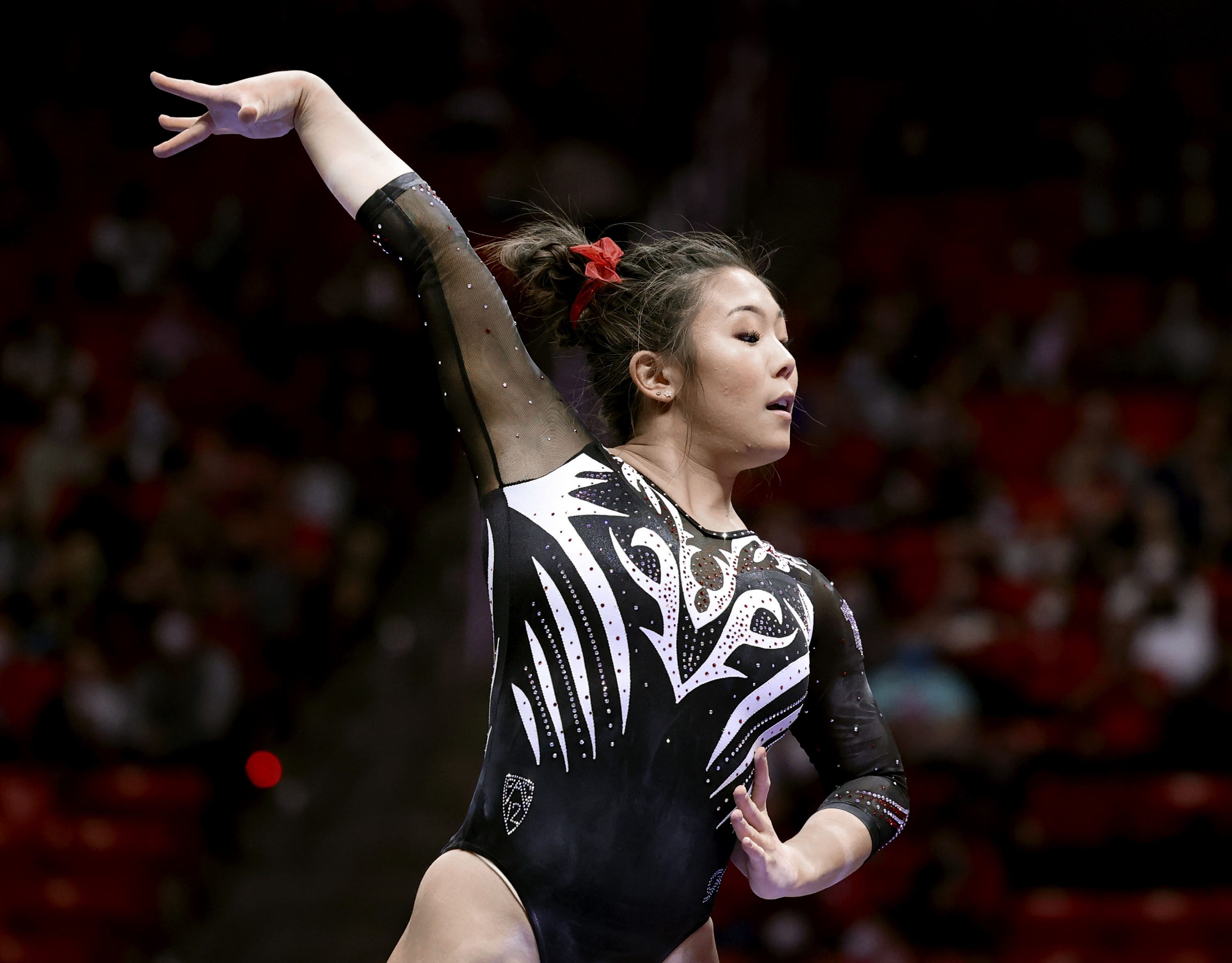 Utah’s Cristal Isa competes on the beam during the gymnastics meet against Arizona State University at the Huntsman Center in Salt Lake City on Friday, Jan. 21, 2022.