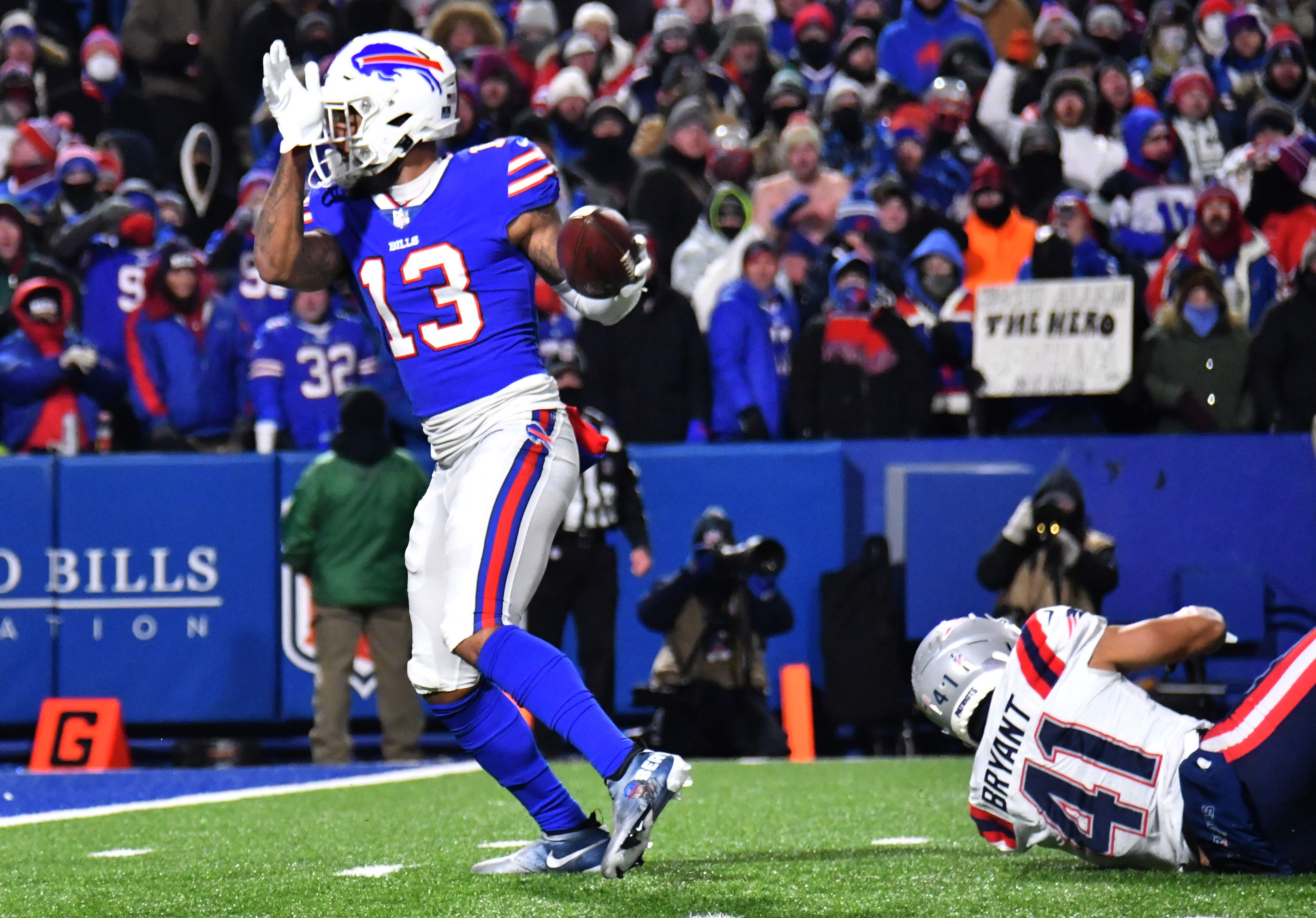 Buffalo Bills wide receiver Gabriel Davis (13) catches a touchdown in front of New England Patriots cornerback Myles Bryant (41) during the 4th quarter of the AFC Wild Card playoff game at Highmark Stadium.