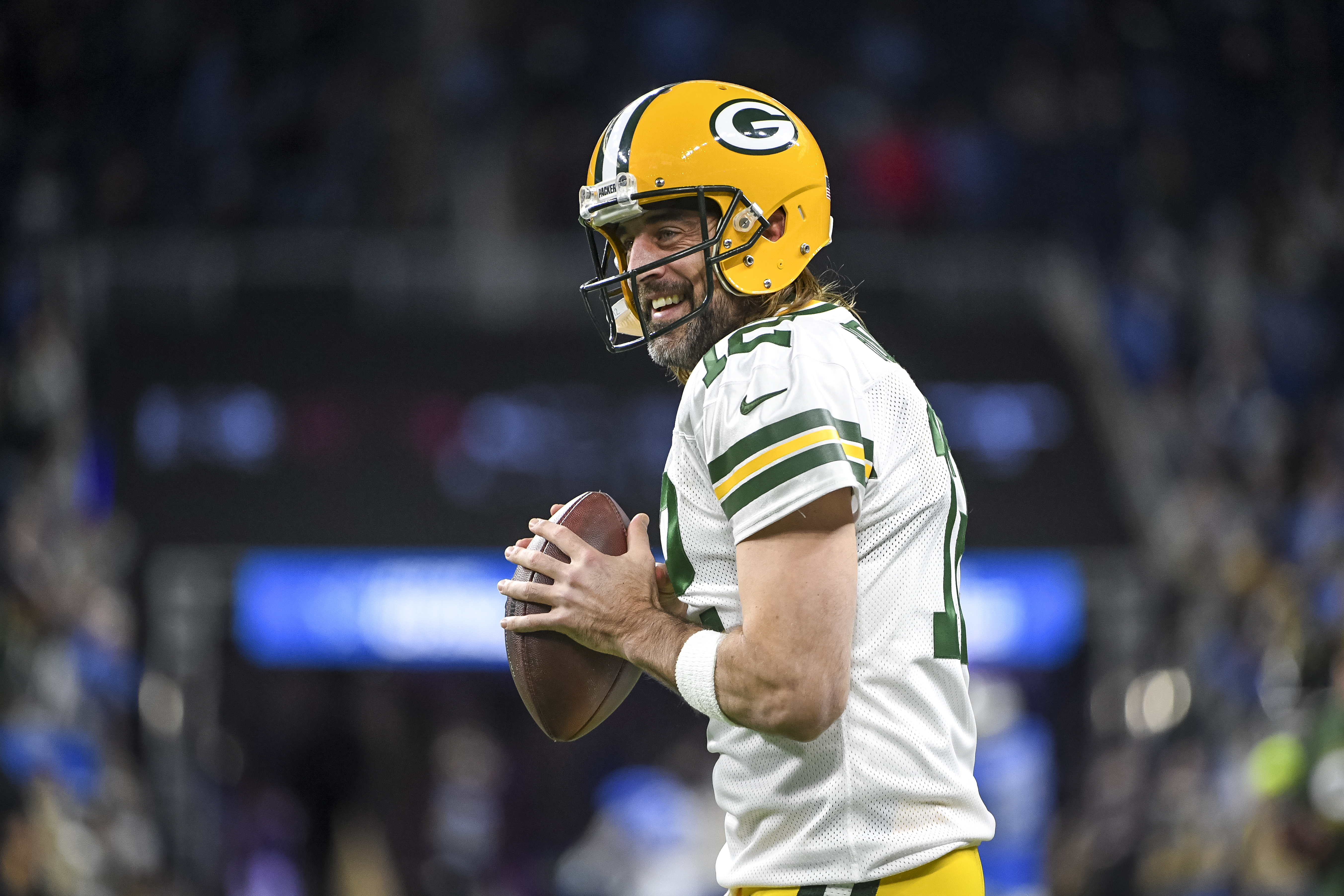 Aaron Rodgers #12 of the Green Bay Packers warms up before the game against the Detroit Lions at Ford Field on January 09, 2022 in Detroit, Michigan.