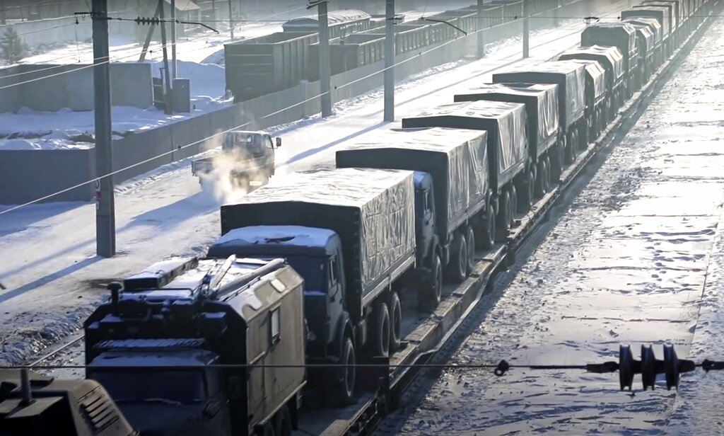 Russian military vehicles on a railway platform in Belarus.