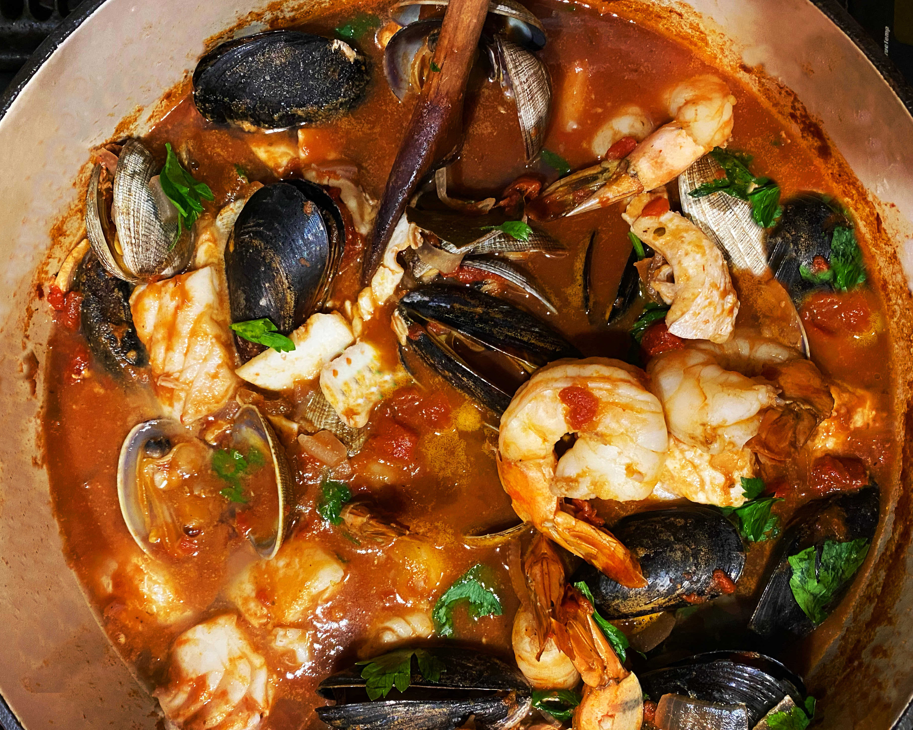 Cioppino is a San Francisco seafood stew that originated in the 1800s when the Italian and Portuguese fishermen chopped up leftovers from their daily catches to make a robust tomato-based soup.