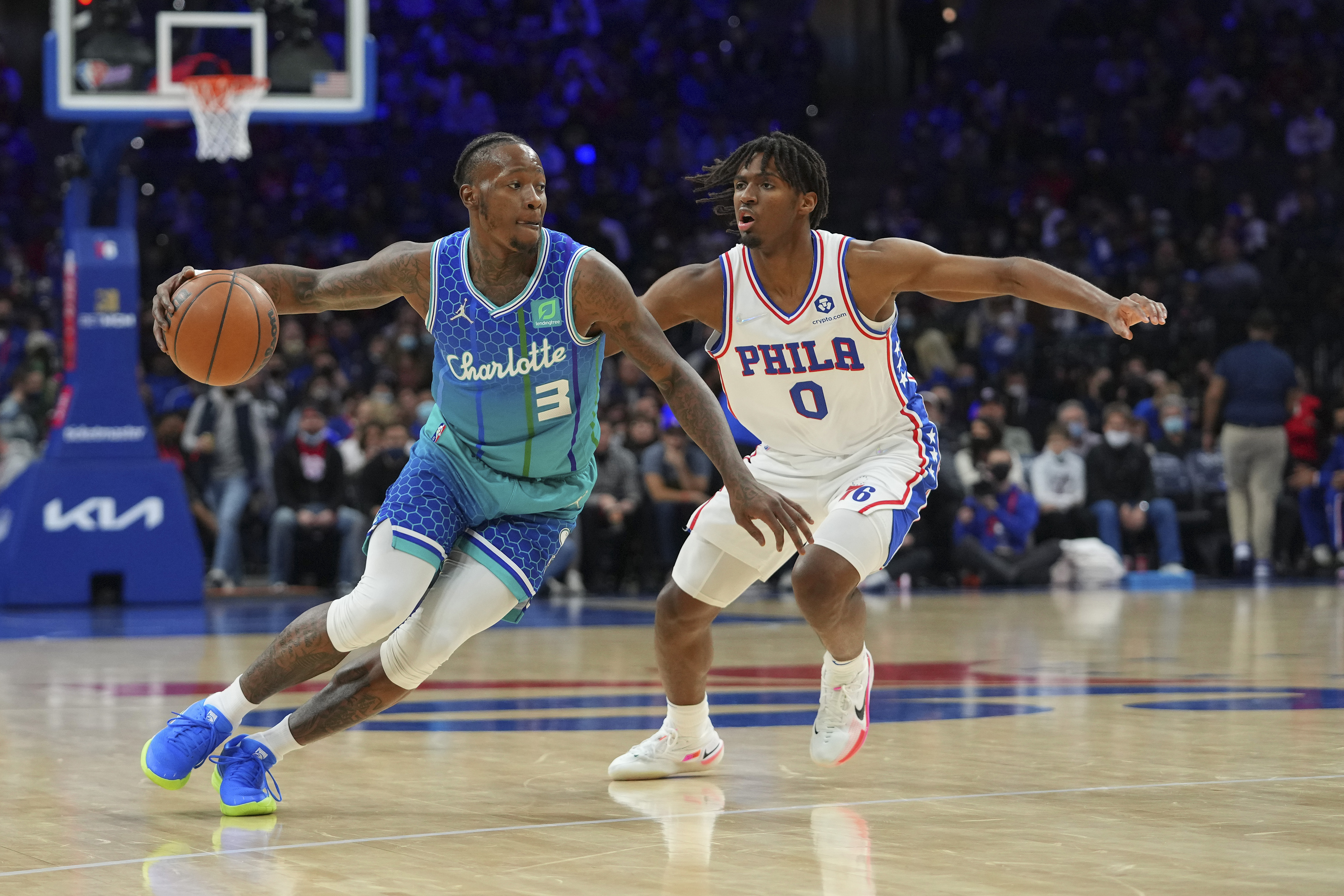 Charlotte Hornets guard Terry Rozier (3) drives to the basket against Philadelphia 76ers guard Tyrese Maxey (0) in the first half at the Wells Fargo Center.