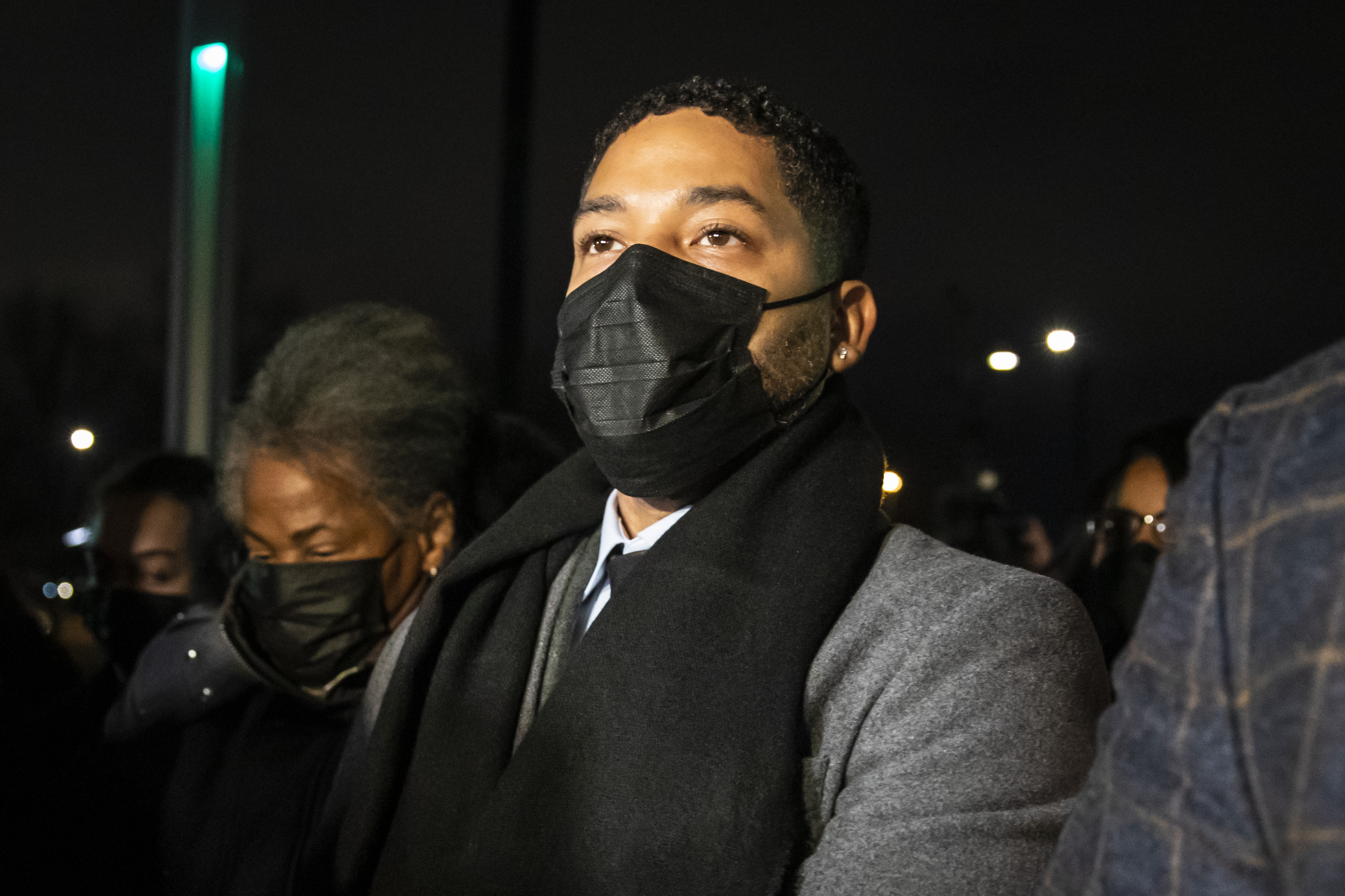 Flanked by family members, supporters, attorneys and bodyguards, former “Empire” star Jussie Smollett walks into the Leighton Criminal Courthouse after the jury reached a verdict on Dec. 9.