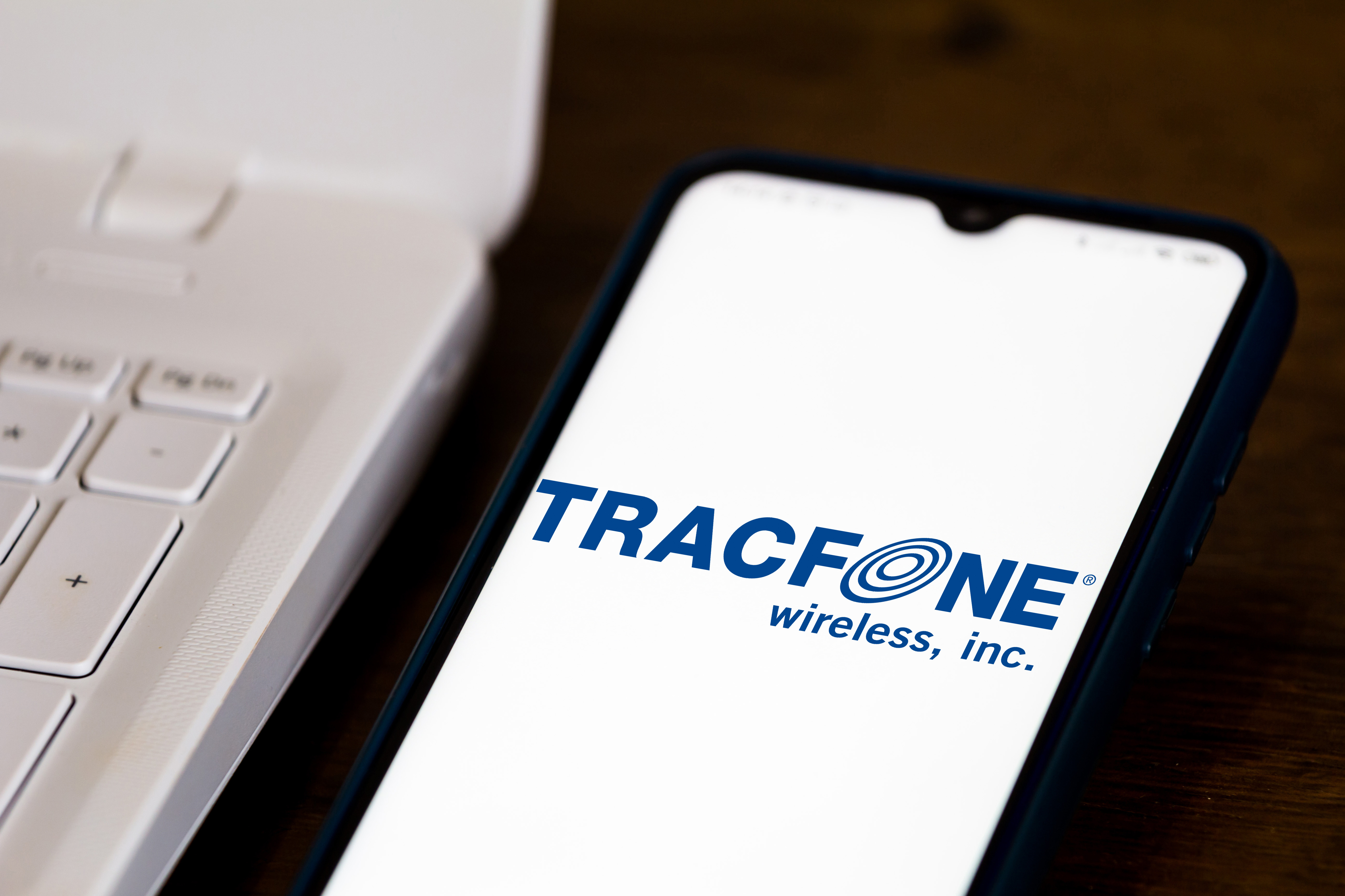 In this photo illustration the TracFone Wireless logo seen displayed on a mobile phone